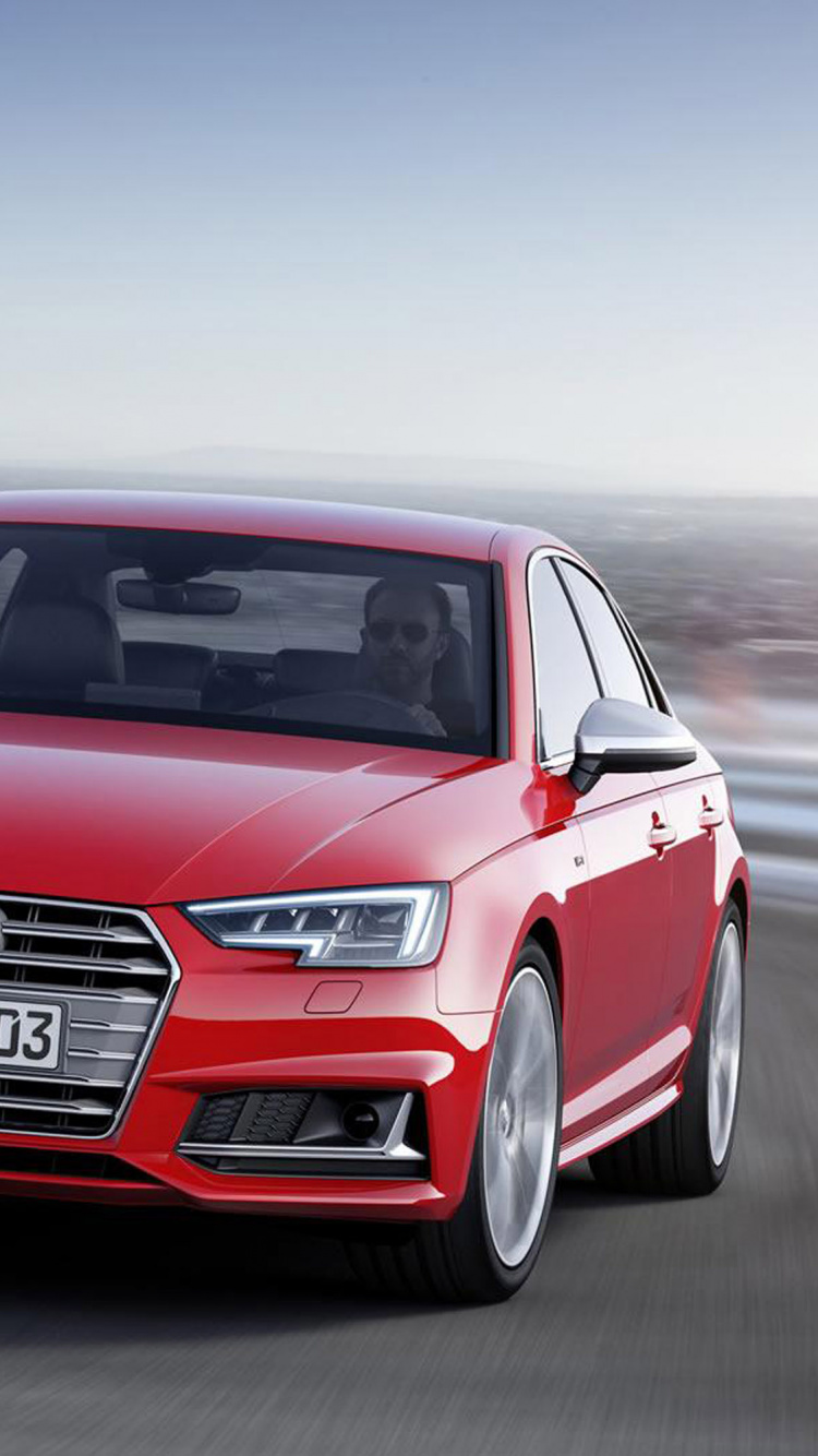 Audi a 4 Rojo en la Carretera Durante el Día. Wallpaper in 750x1334 Resolution