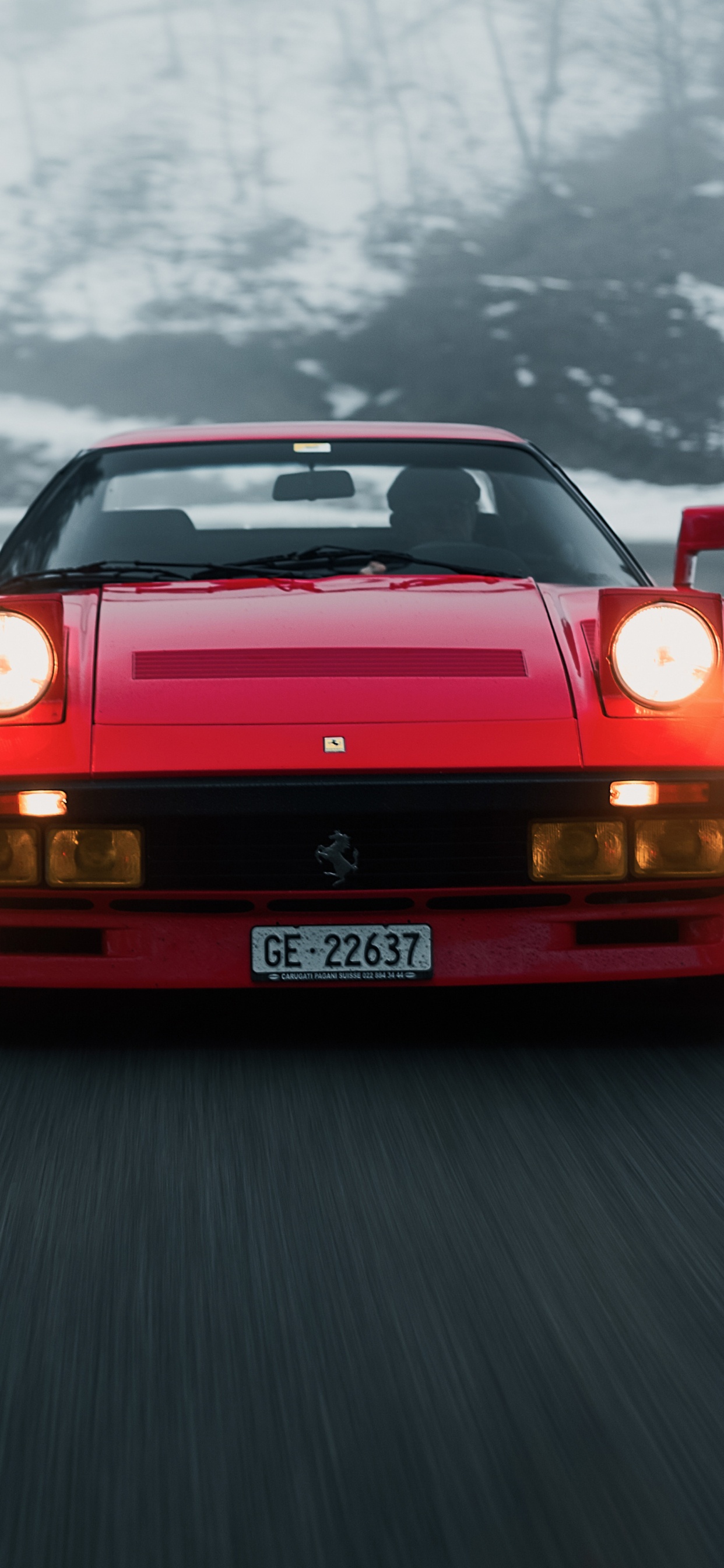 Roter Porsche 911 Tagsüber Unterwegs. Wallpaper in 1242x2688 Resolution