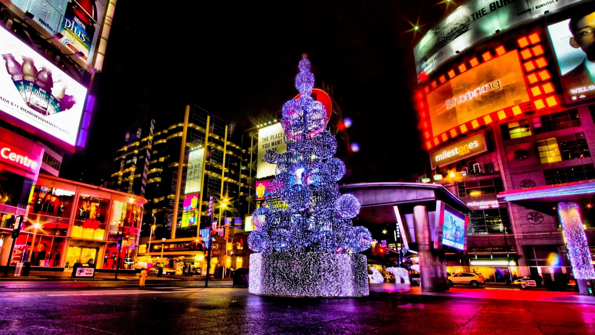 Green and Red Christmas Tree With String Lights During Night Time. Wallpaper in 1920x1080 Resolution