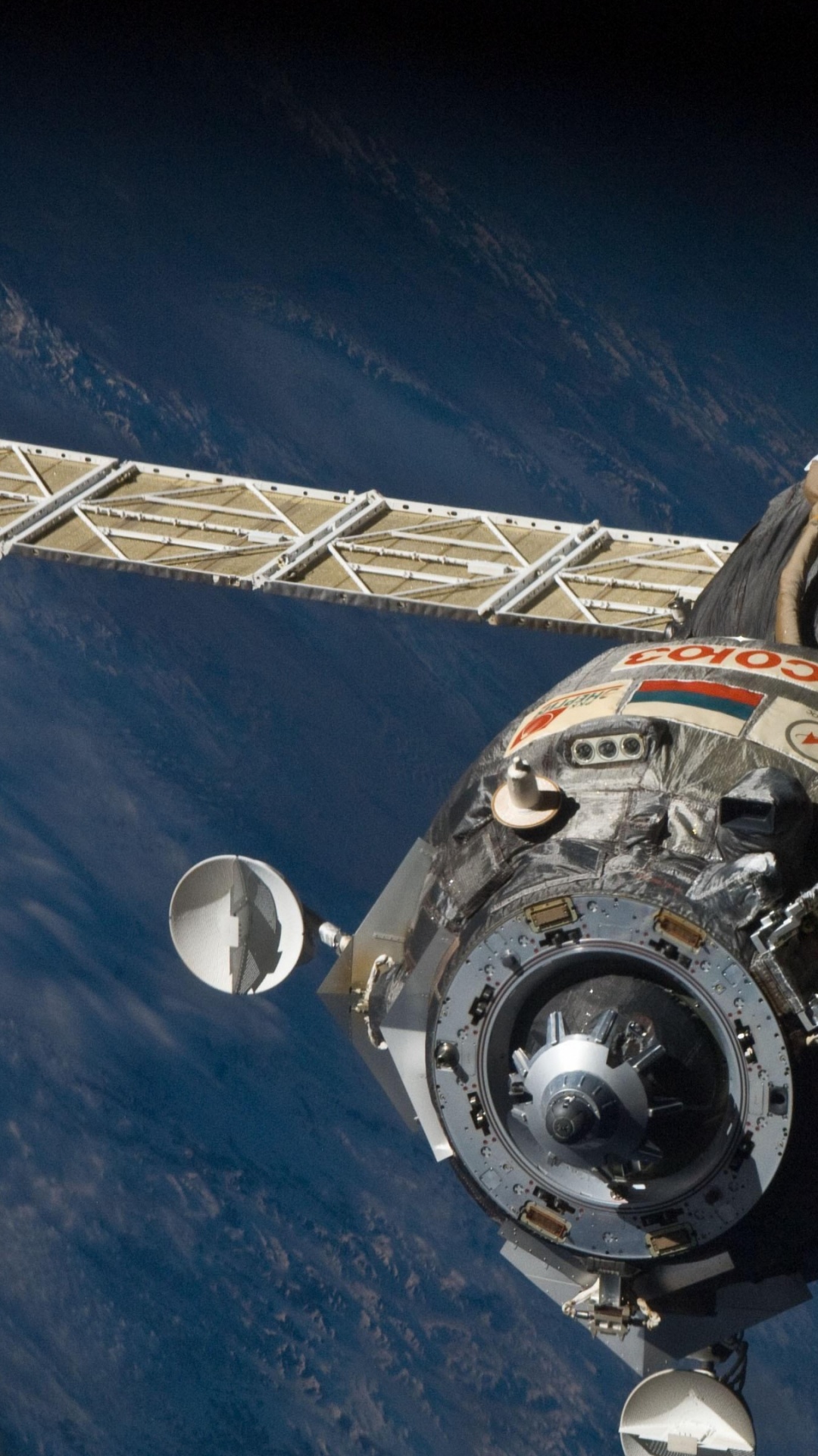 White and Black Space Ship on Blue Sky. Wallpaper in 1080x1920 Resolution