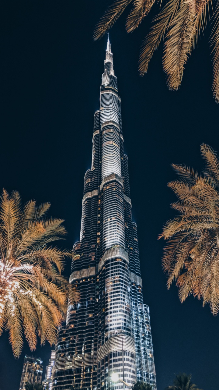 Torre Gris y Negra Durante la Noche. Wallpaper in 720x1280 Resolution