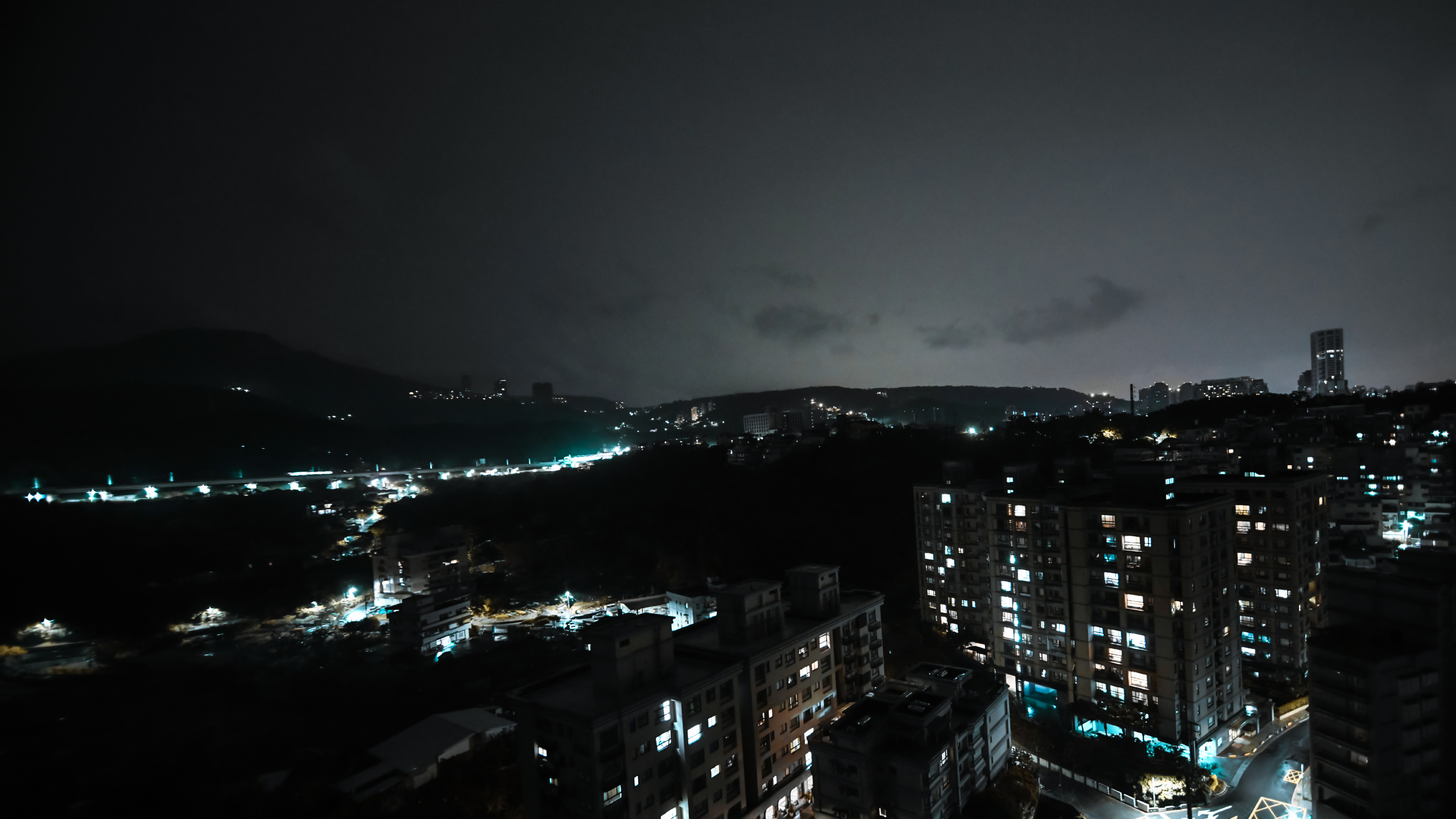 City Skyline During Night Time. Wallpaper in 2560x1440 Resolution