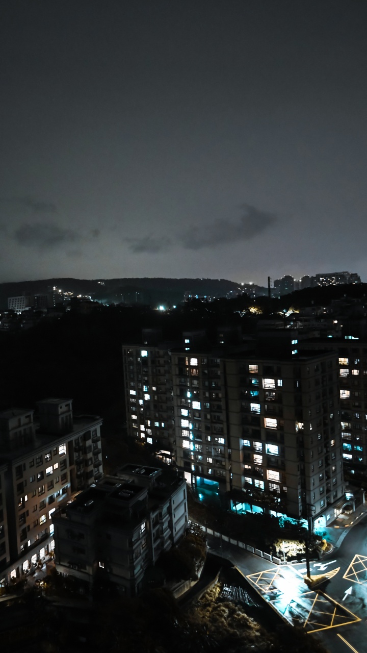 City Skyline During Night Time. Wallpaper in 720x1280 Resolution