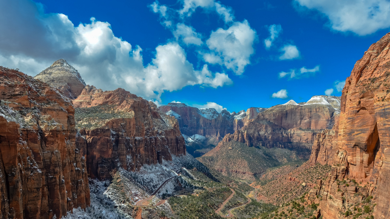 Brown Rocky Mountain Under Blue Sky During Daytime. Wallpaper in 1280x720 Resolution