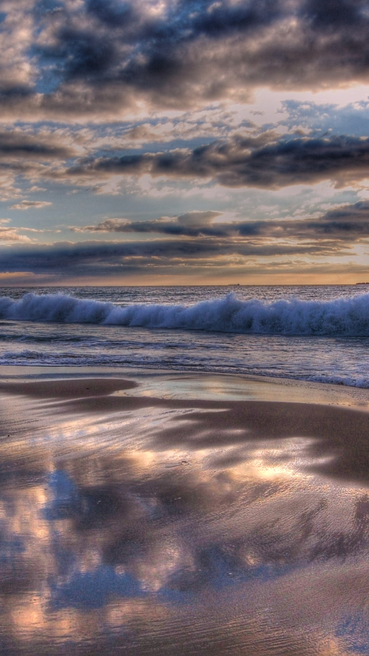 Body of Water Under Cloudy Sky During Daytime. Wallpaper in 750x1334 Resolution