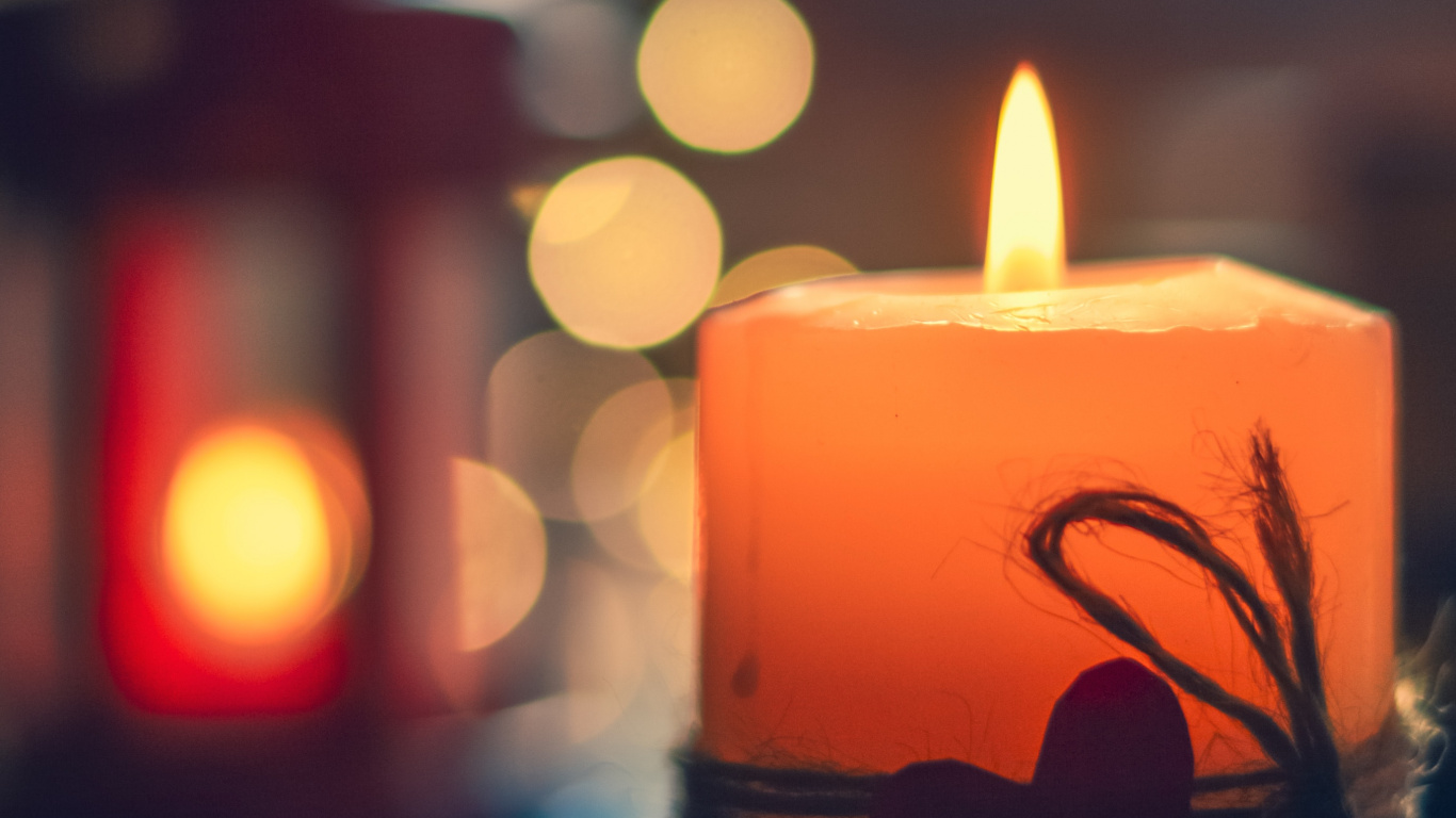 Lighted Candle on Black Metal Candle Holder. Wallpaper in 1366x768 Resolution