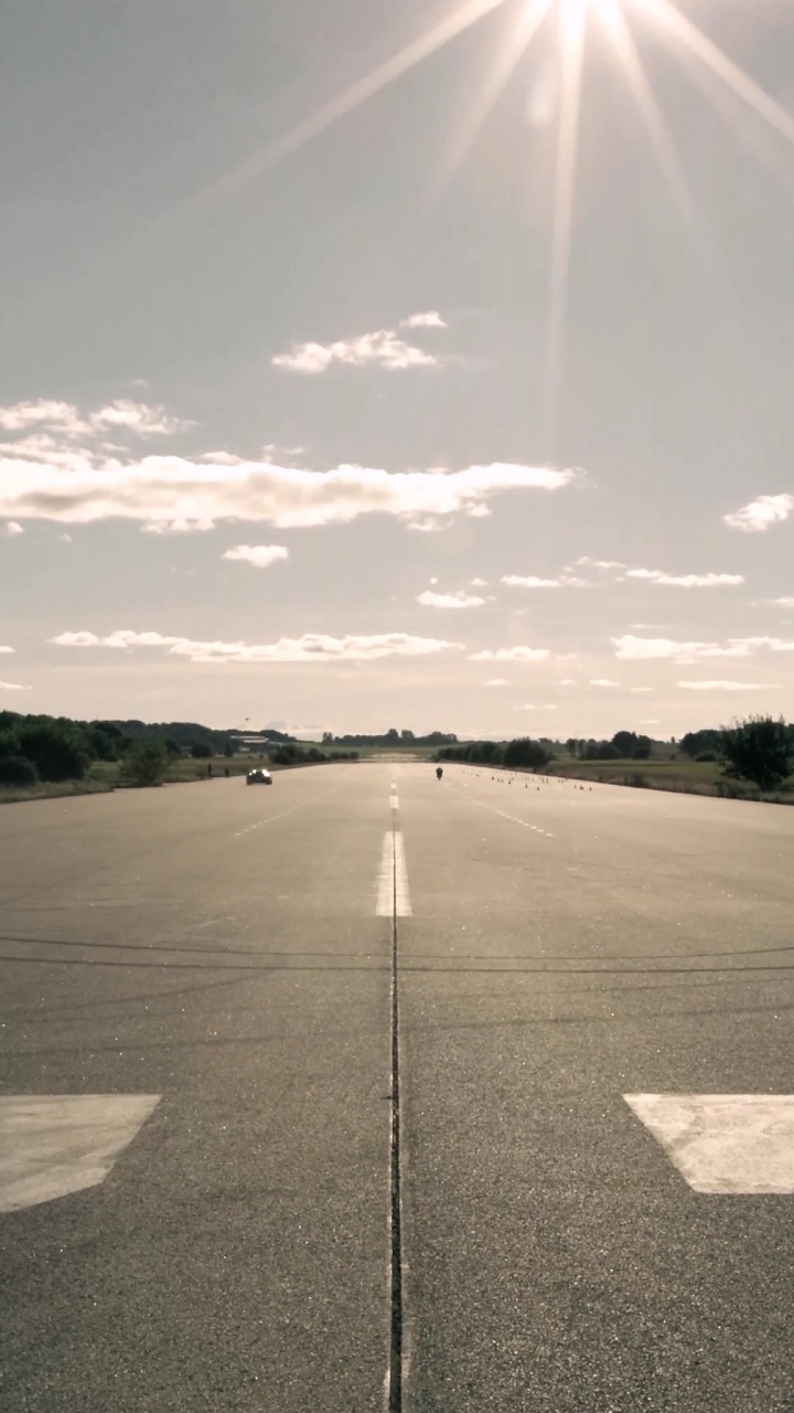 Gray Concrete Road Under White Clouds During Daytime. Wallpaper in 720x1280 Resolution