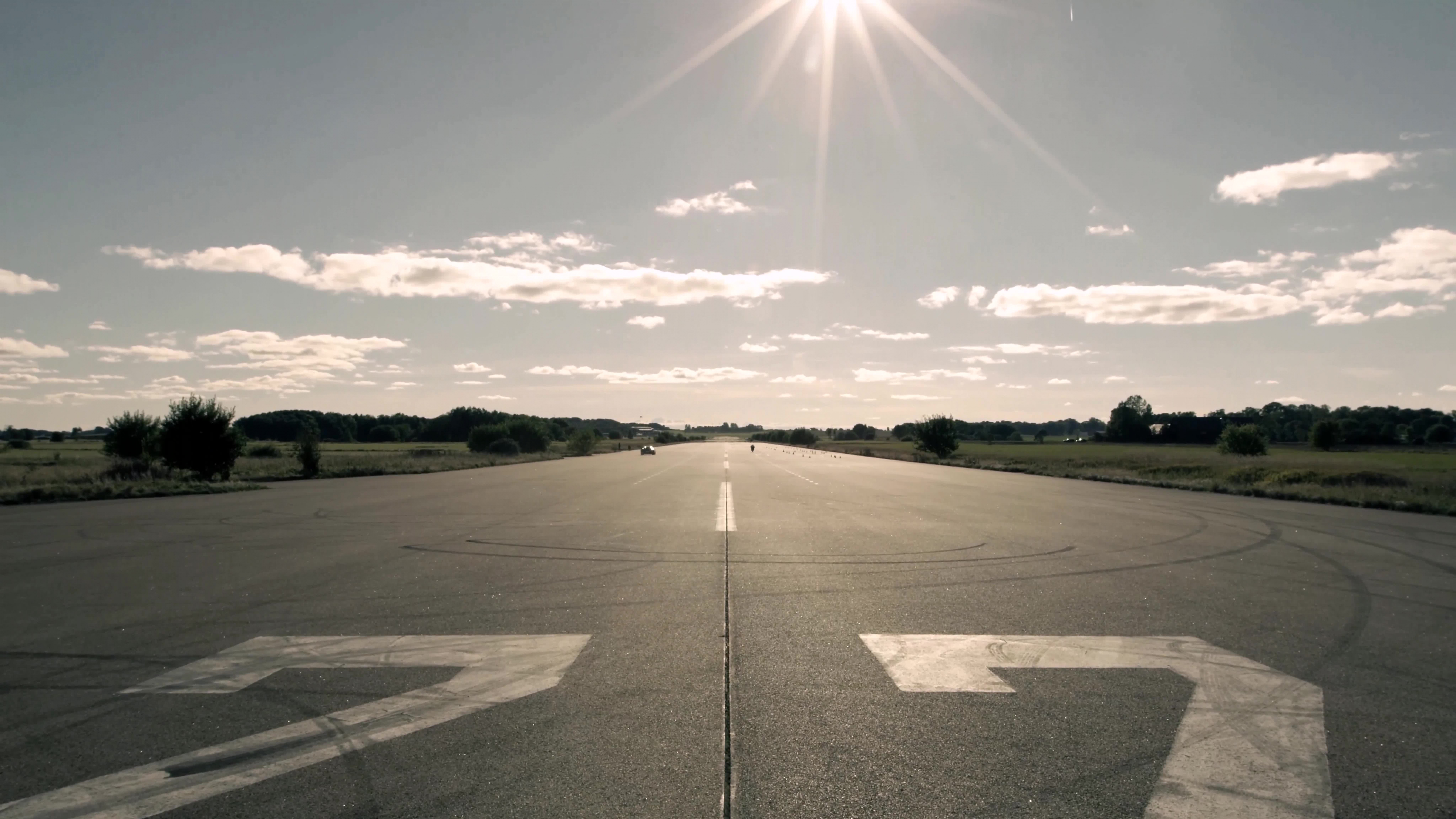 Gray Concrete Road Under White Clouds During Daytime. Wallpaper in 7680x4320 Resolution