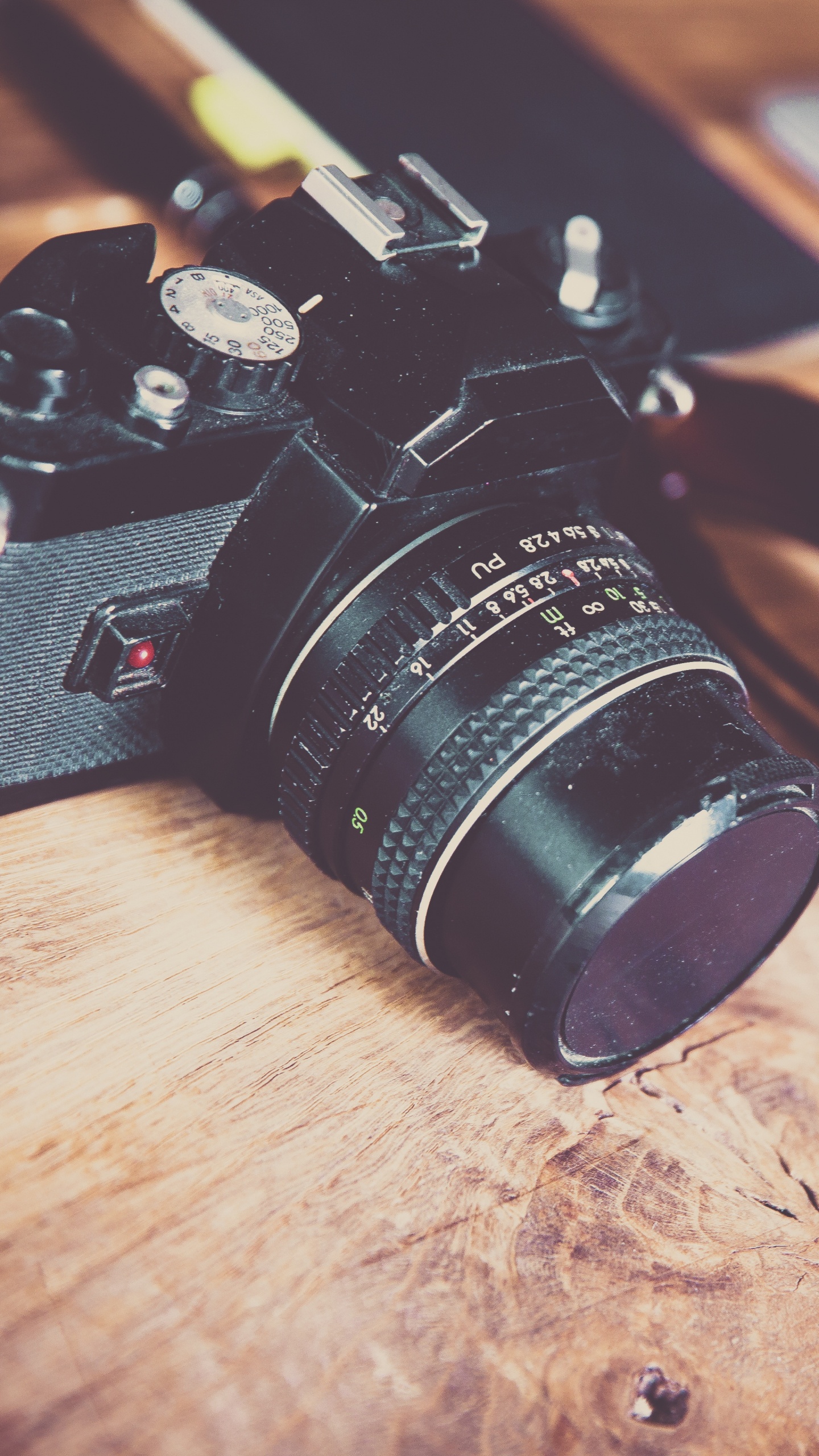 Black Nikon Dslr Camera on Brown Wooden Table. Wallpaper in 1440x2560 Resolution