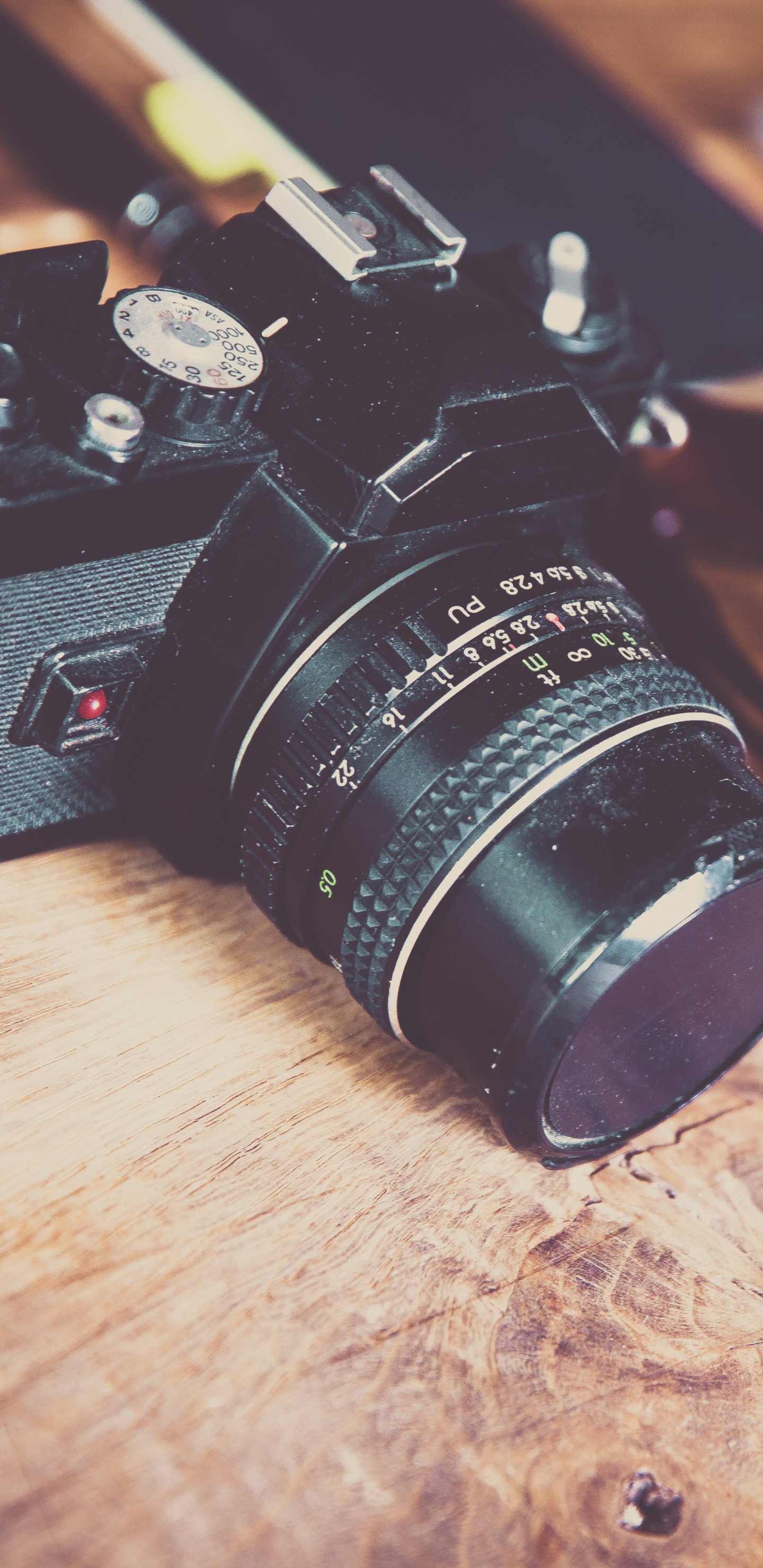Black Nikon Dslr Camera on Brown Wooden Table. Wallpaper in 1440x2960 Resolution