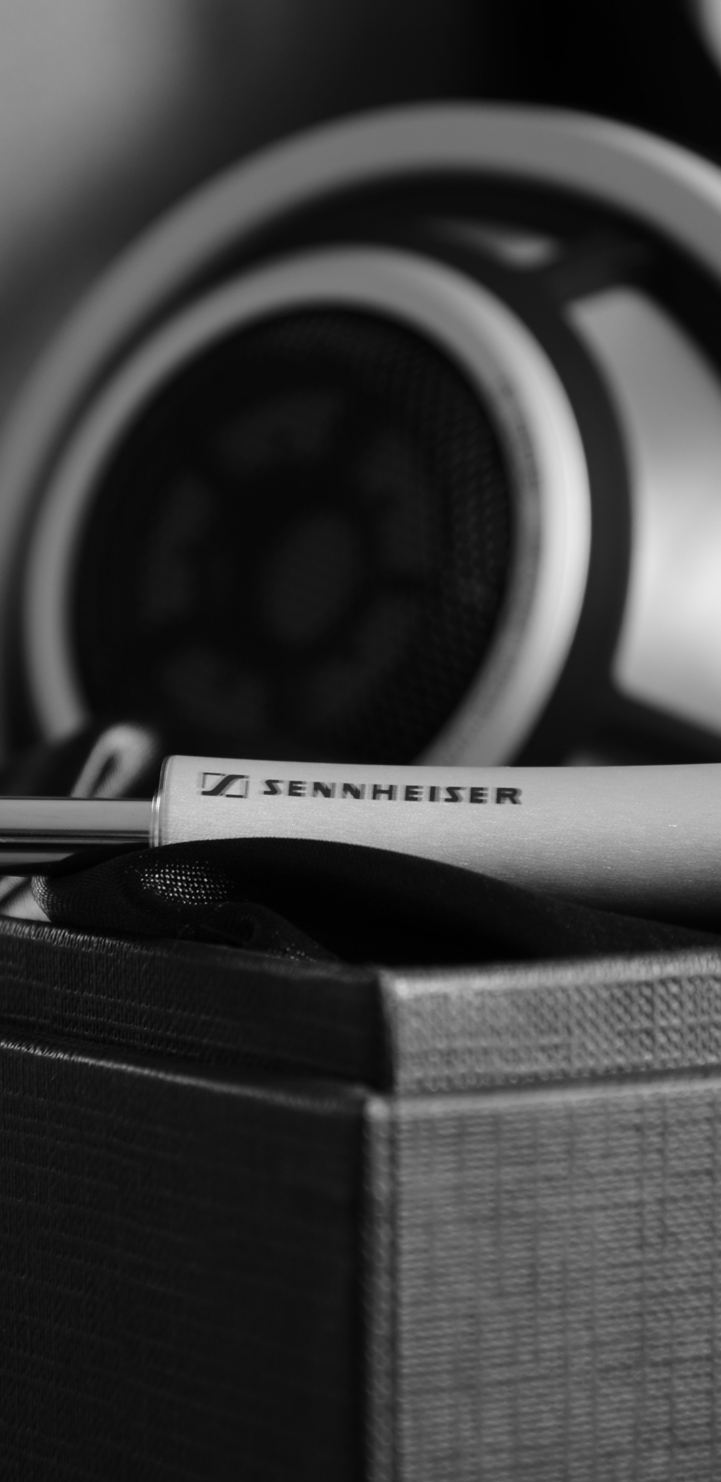 Black and White Headphones on Brown Box. Wallpaper in 1440x2960 Resolution