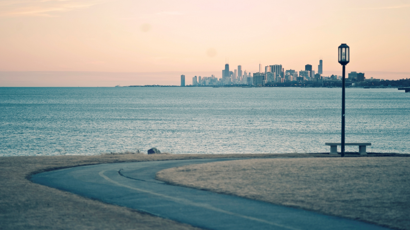 Body of Water Near City Buildings During Daytime. Wallpaper in 1366x768 Resolution