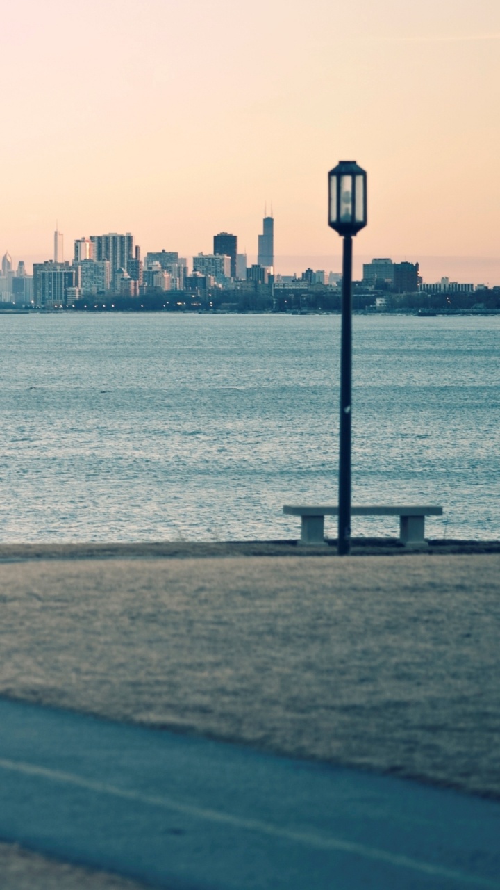 Body of Water Near City Buildings During Daytime. Wallpaper in 720x1280 Resolution