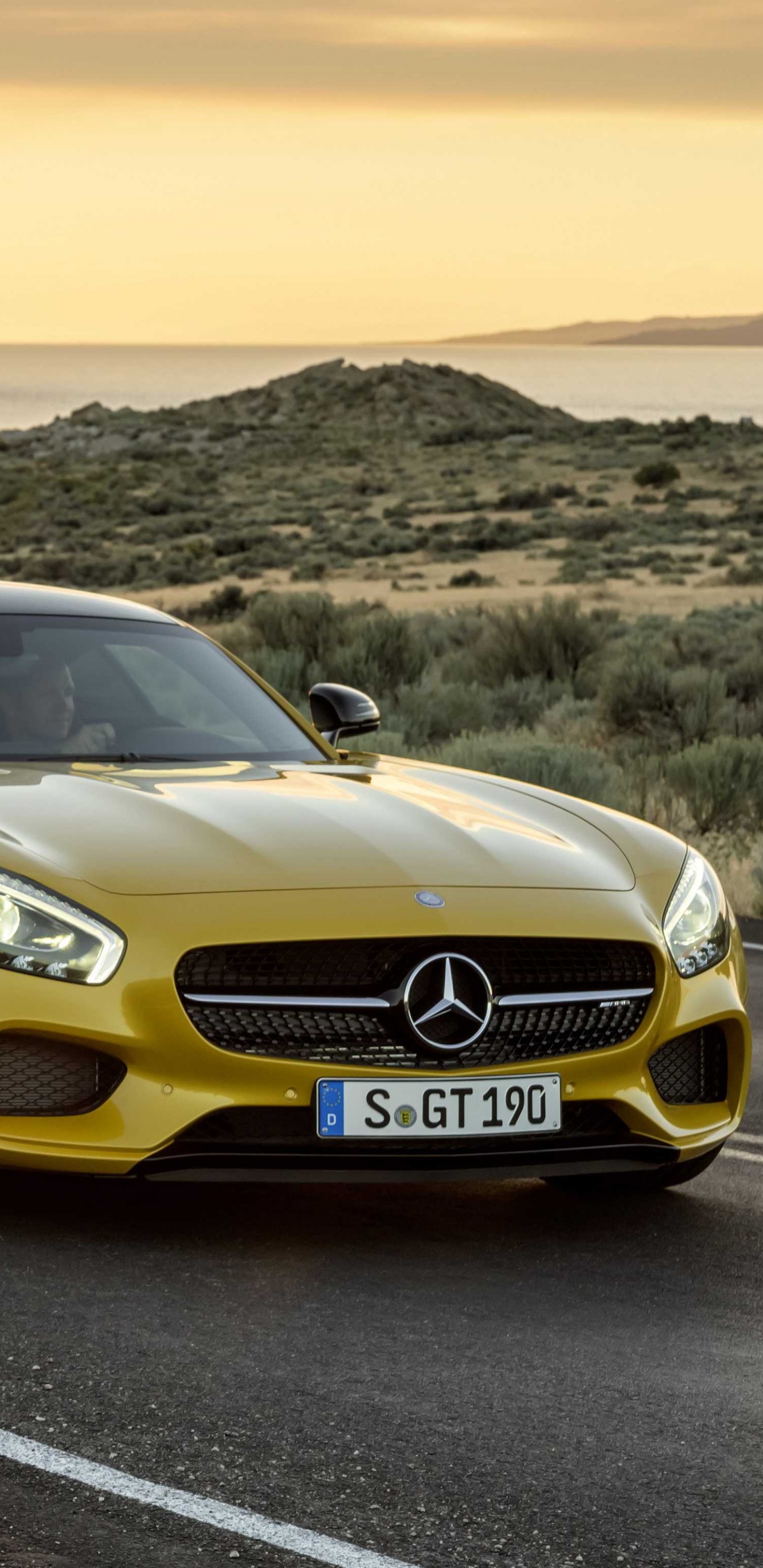 Yellow Mercedes Benz Coupe on Road During Daytime. Wallpaper in 1440x2960 Resolution