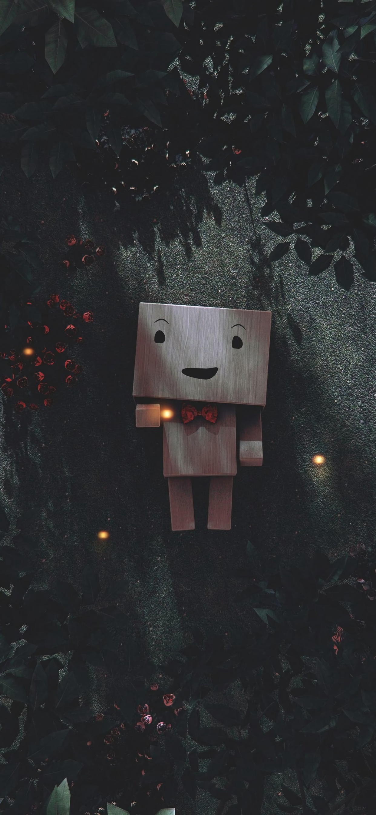 Casita Para Aves de Madera Marrón Sobre Hojas Verdes. Wallpaper in 1242x2688 Resolution