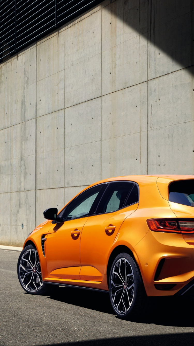 Orange Porsche 911 Parked Beside White Wall. Wallpaper in 750x1334 Resolution