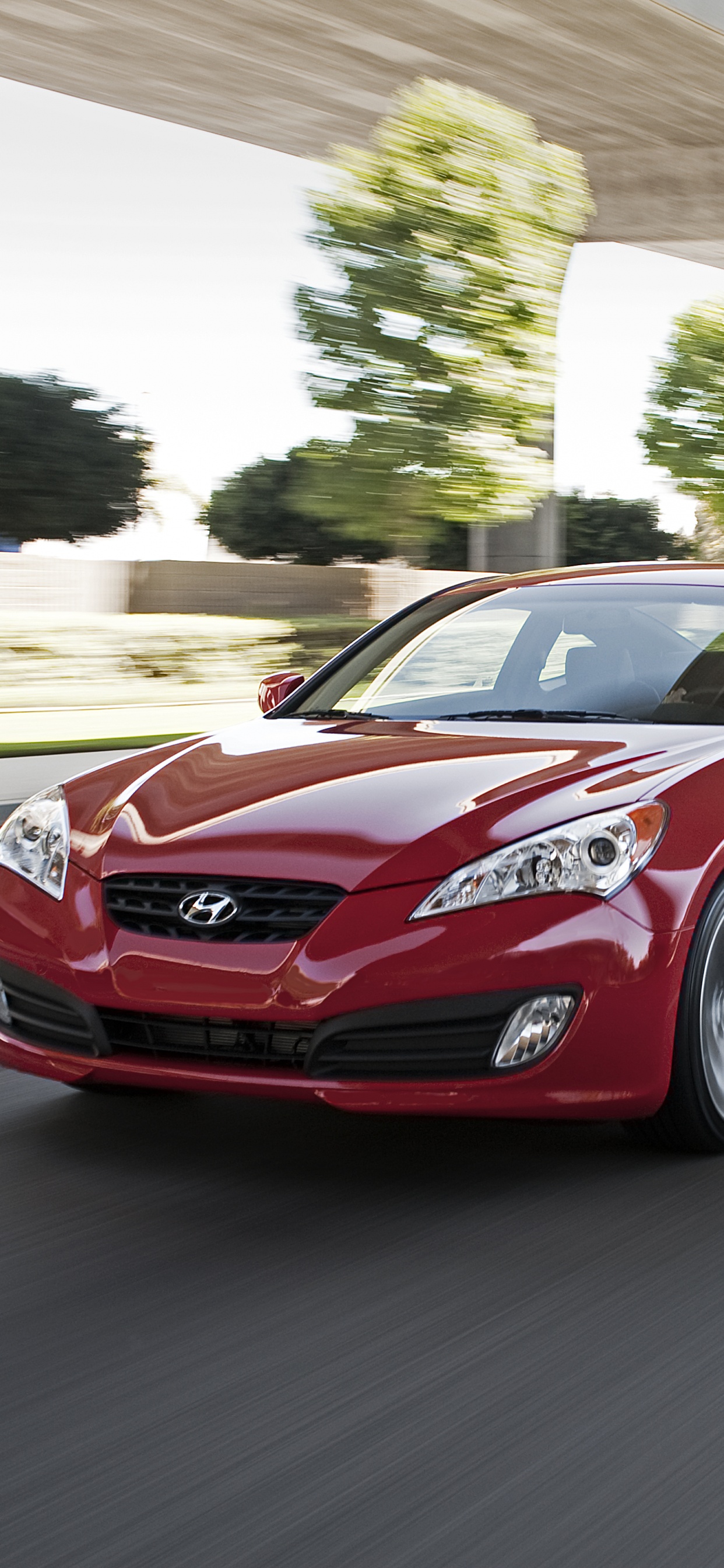 Porsche 911 Rouge Sur Route Pendant la Journée. Wallpaper in 1242x2688 Resolution