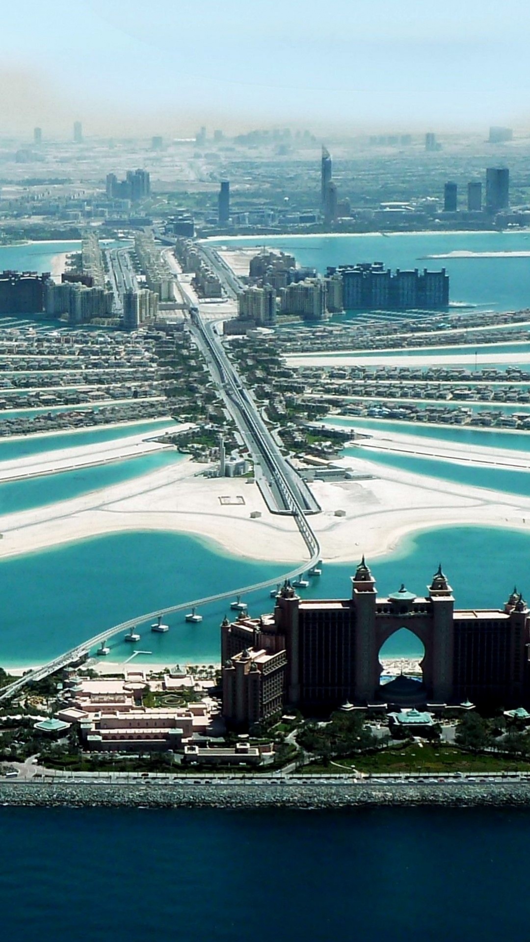 Luftaufnahme Von Stadtgebäuden in Der Nähe Von Gewässern Tagsüber. Wallpaper in 1080x1920 Resolution