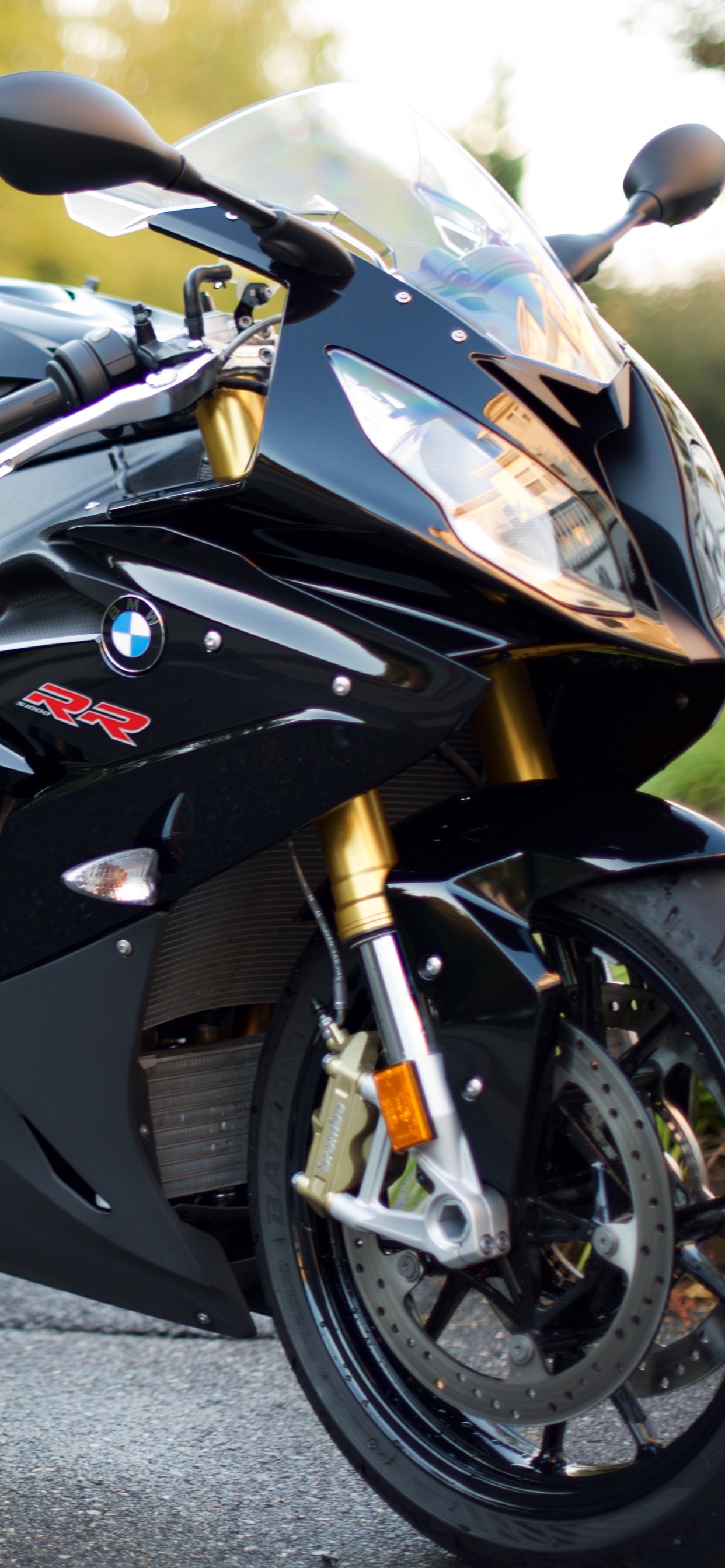 Black and White Sports Bike on Road During Daytime. Wallpaper in 1242x2688 Resolution