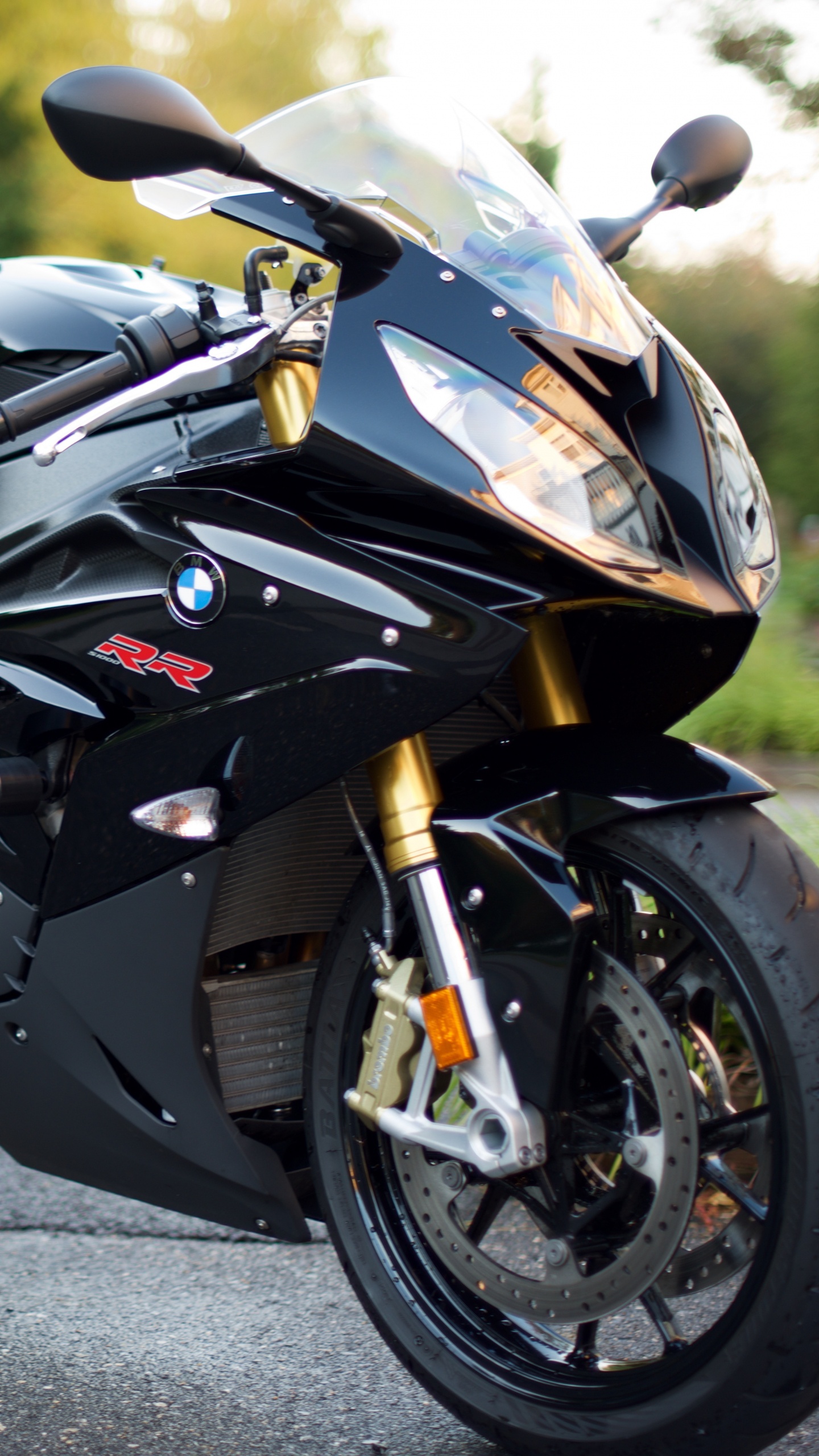 Black and White Sports Bike on Road During Daytime. Wallpaper in 1440x2560 Resolution