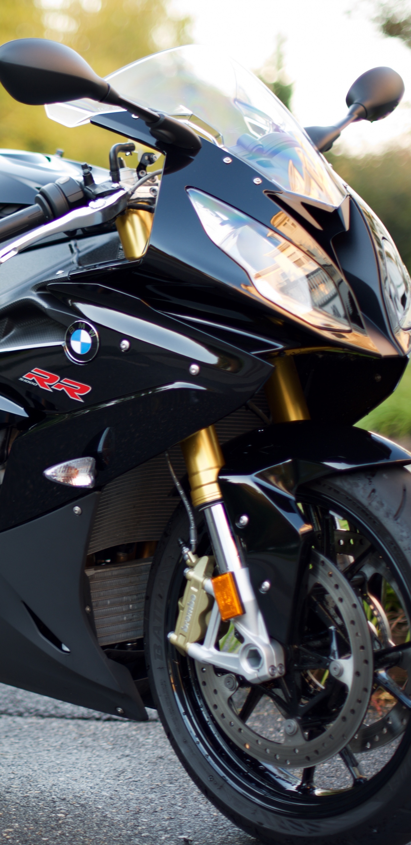 Black and White Sports Bike on Road During Daytime. Wallpaper in 1440x2960 Resolution