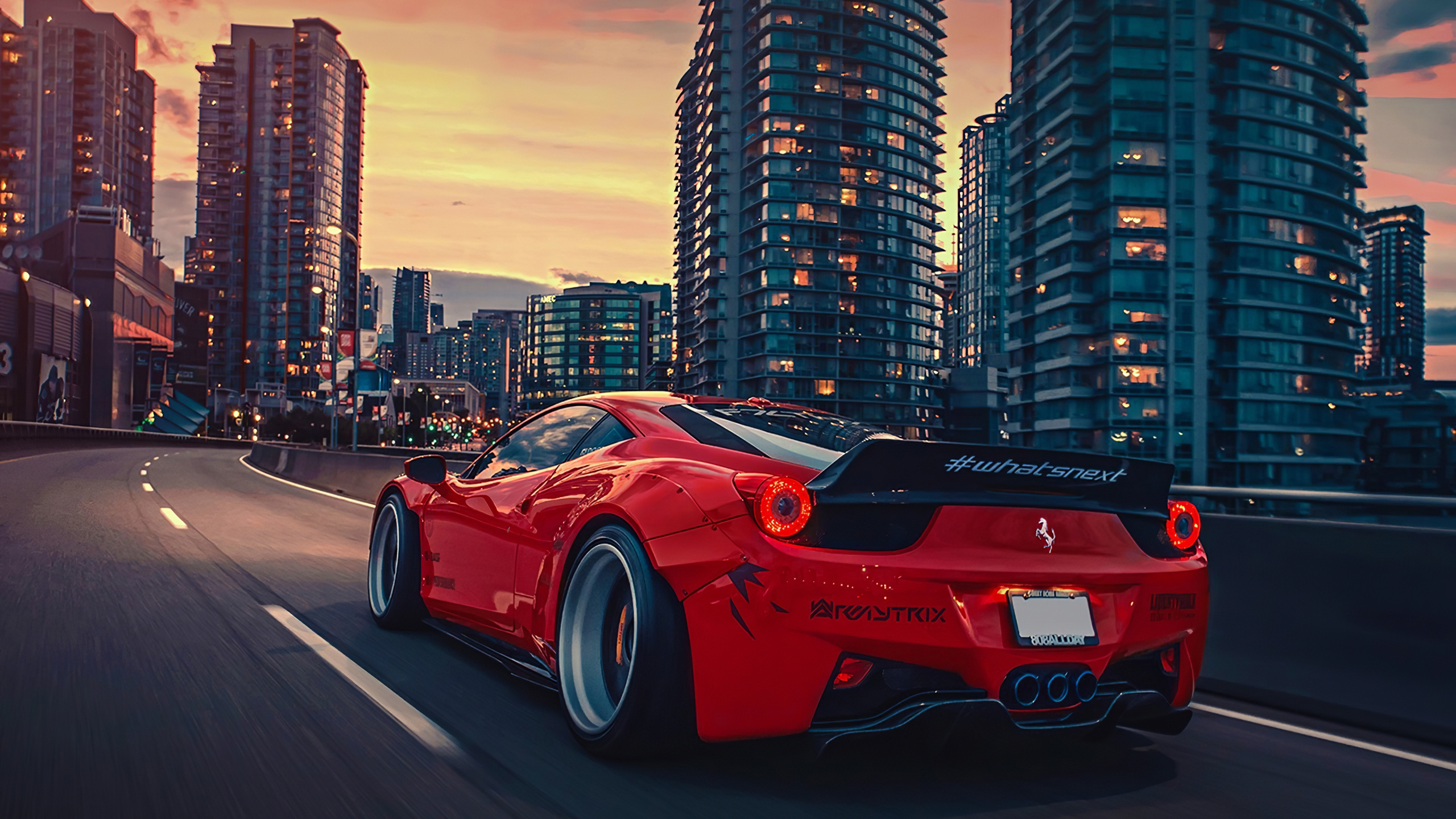 Red Ferrari 458 Italia on Road Near City Buildings During Daytime. Wallpaper in 2560x1440 Resolution