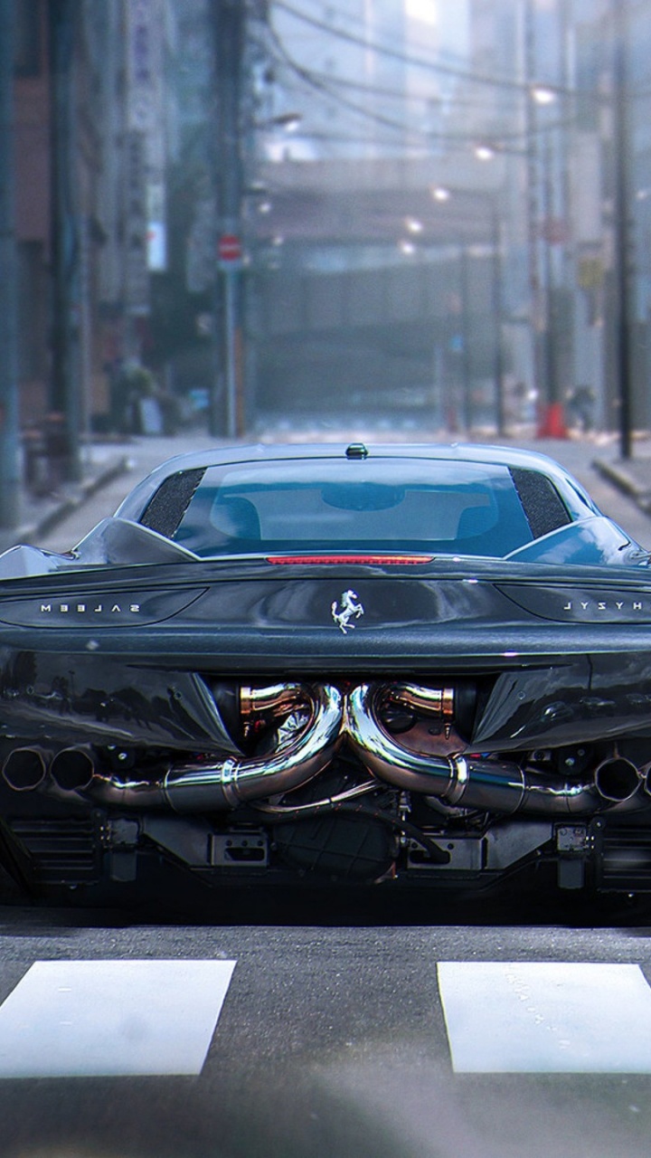 Porsche 911 Noire Sur Route Pendant la Journée. Wallpaper in 720x1280 Resolution