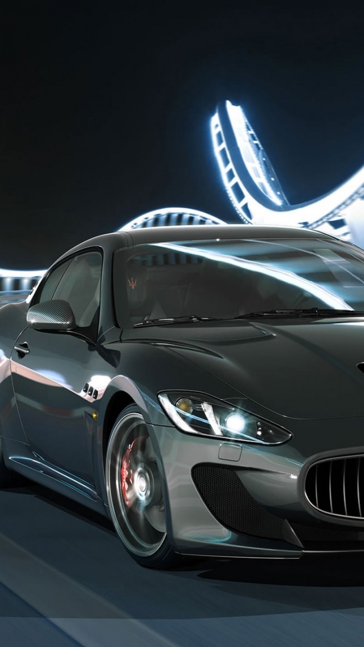 Schwarzer Porsche 911 Unterwegs. Wallpaper in 720x1280 Resolution