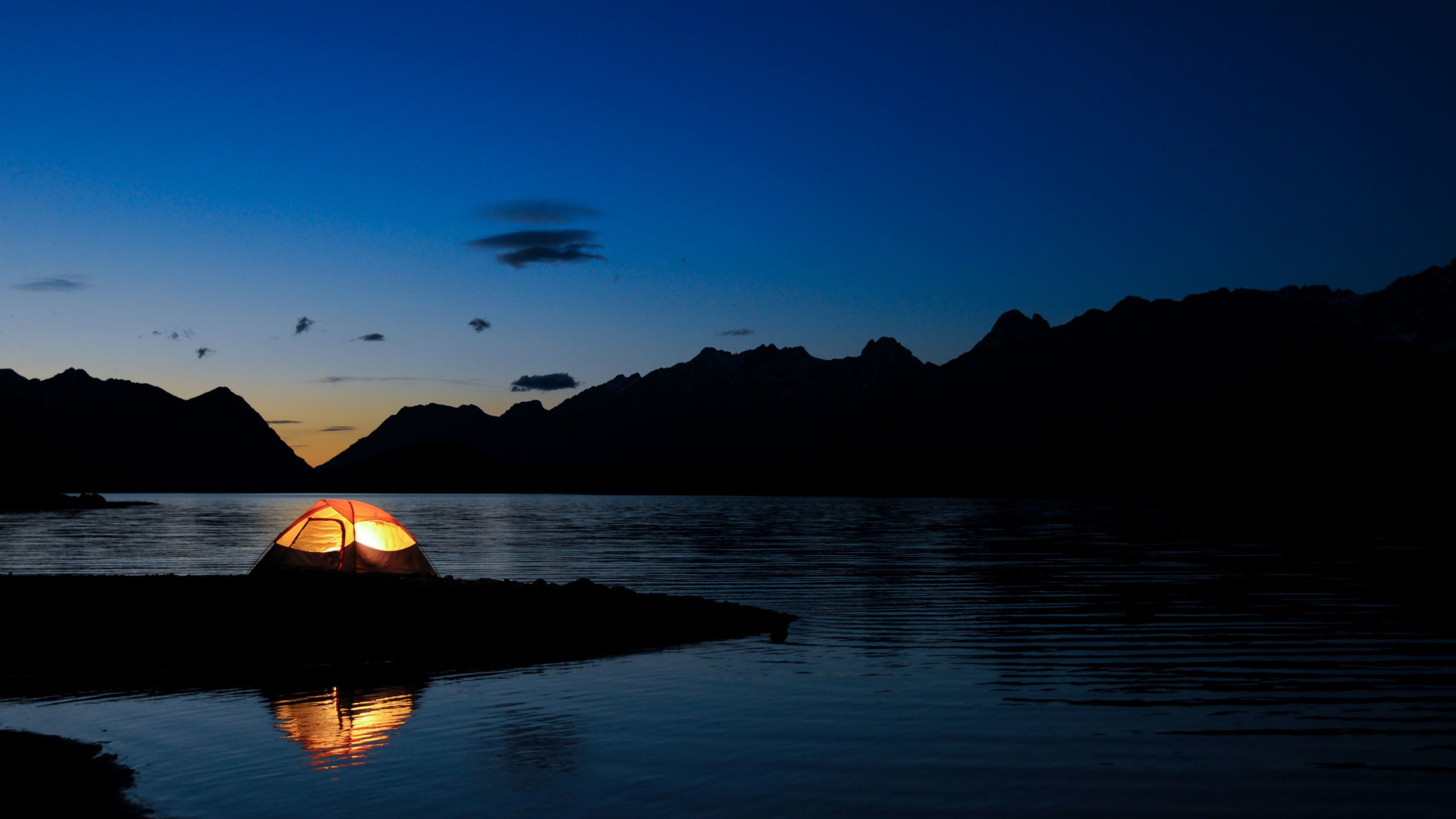 Silhouette of Mountain Near Body of Water During Sunset. Wallpaper in 1920x1080 Resolution