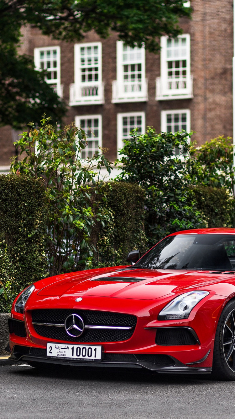 Red Ferrari 458 Italia on Road Near Building During Daytime. Wallpaper in 750x1334 Resolution