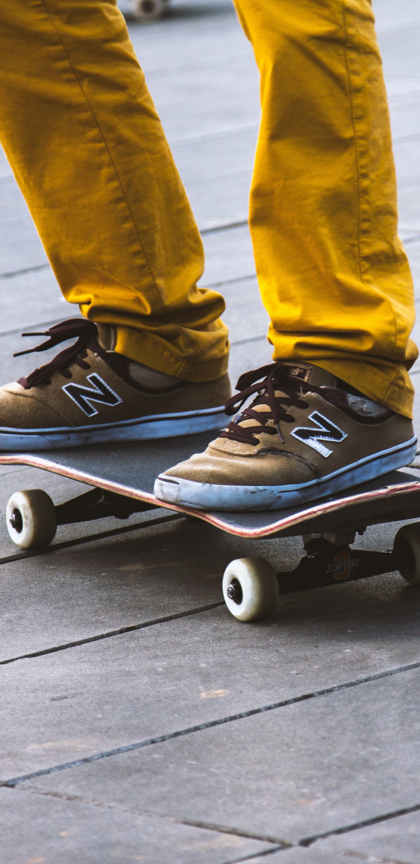 Person in Blue Denim Jeans and Blue Nike Sneakers Riding on Blue Skateboard. Wallpaper in 1440x2960 Resolution