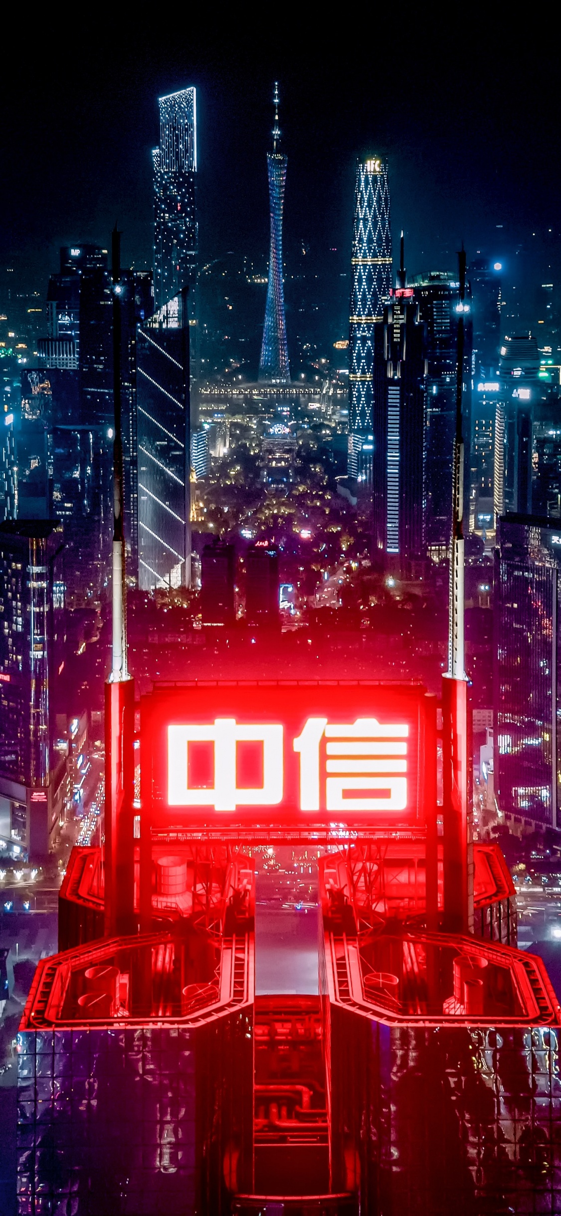 Red and Black City Buildings During Night Time. Wallpaper in 1125x2436 Resolution