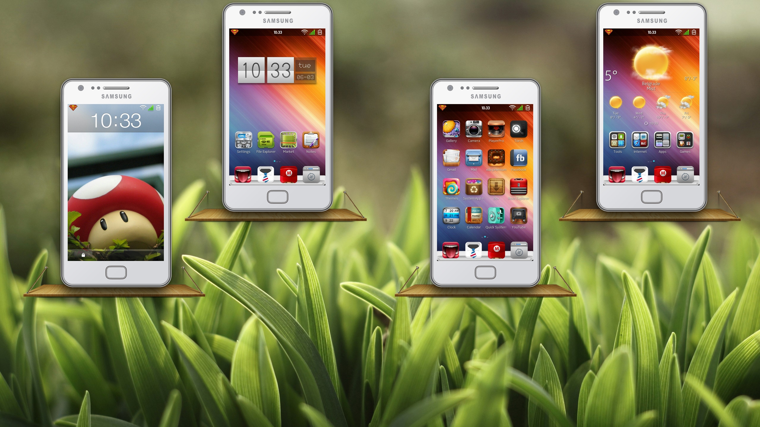 Smartphone Samsung Galaxy Blanco Sobre Hierba Verde. Wallpaper in 2560x1440 Resolution