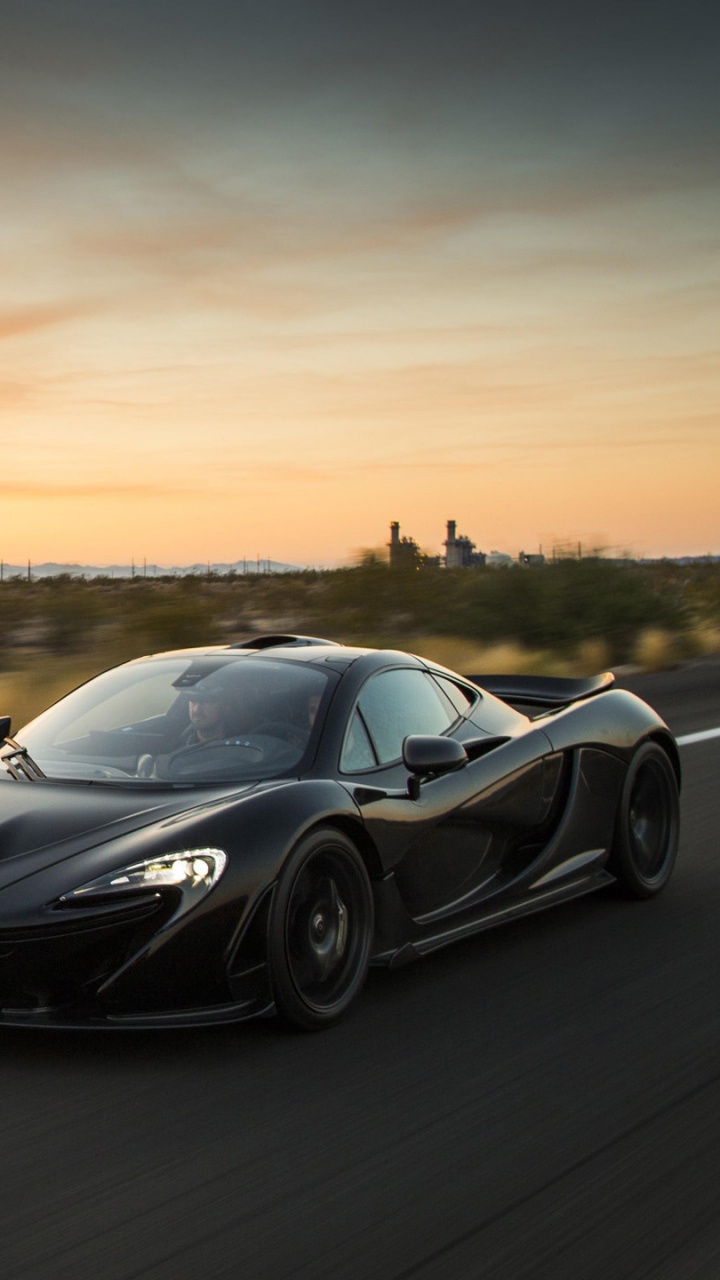 Porsche 911 Noire Sur Route Pendant la Journée. Wallpaper in 720x1280 Resolution