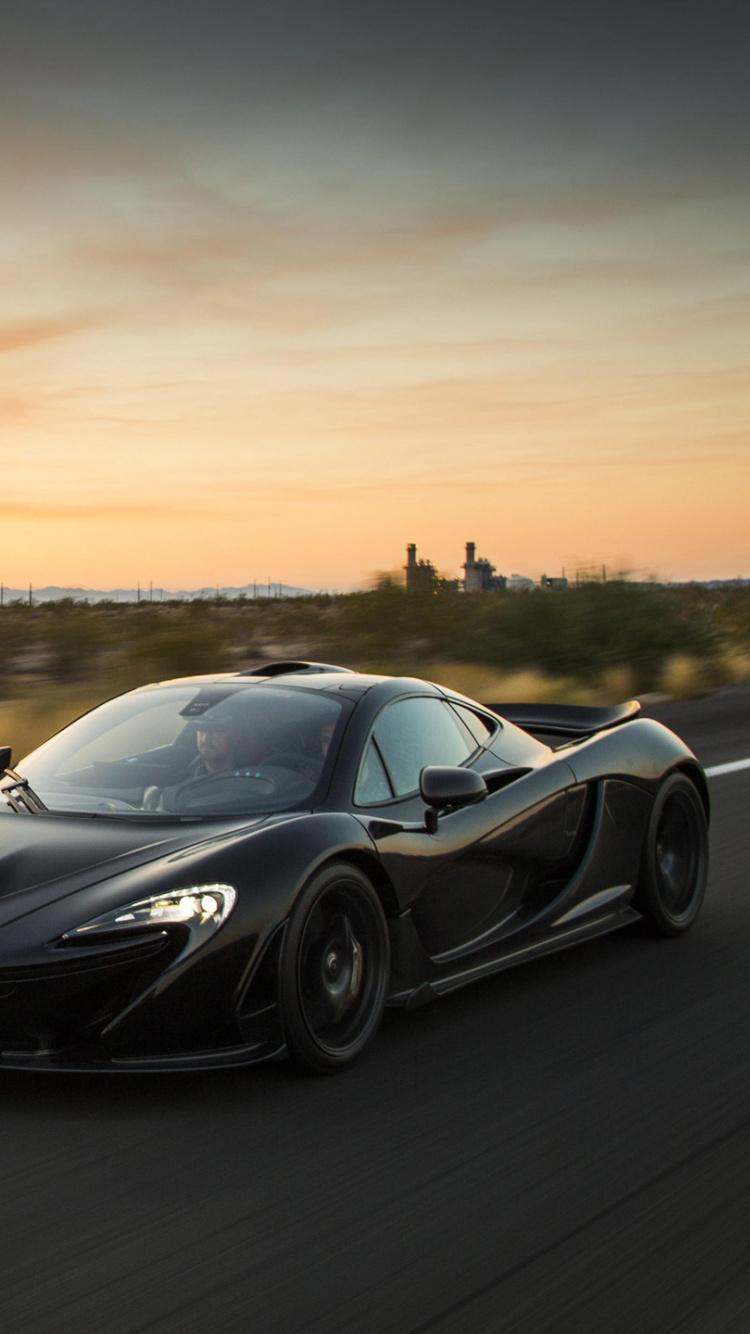 Porsche 911 Noire Sur Route Pendant la Journée. Wallpaper in 750x1334 Resolution