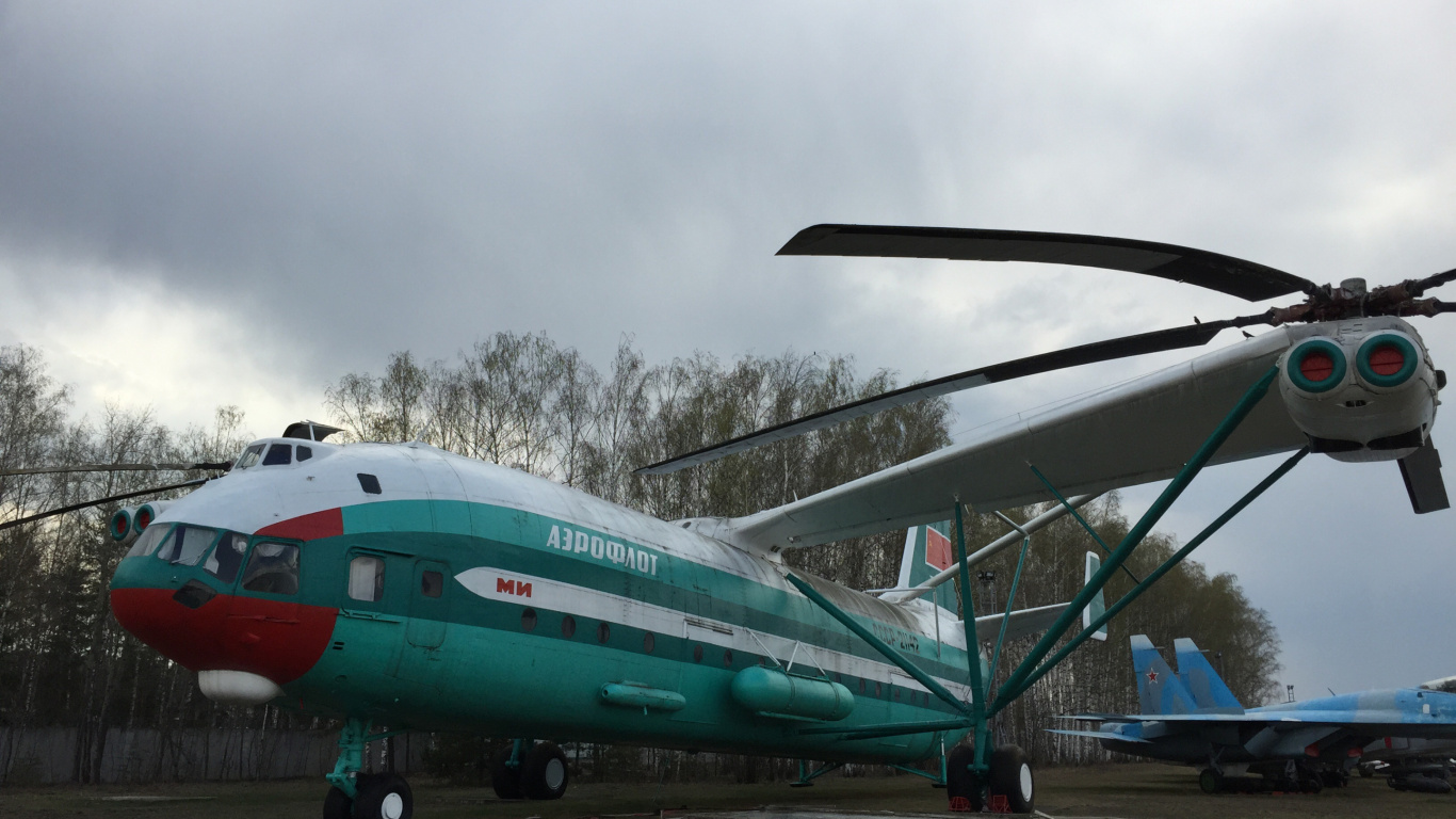 White and Blue Airplane Under White Clouds During Daytime. Wallpaper in 1366x768 Resolution