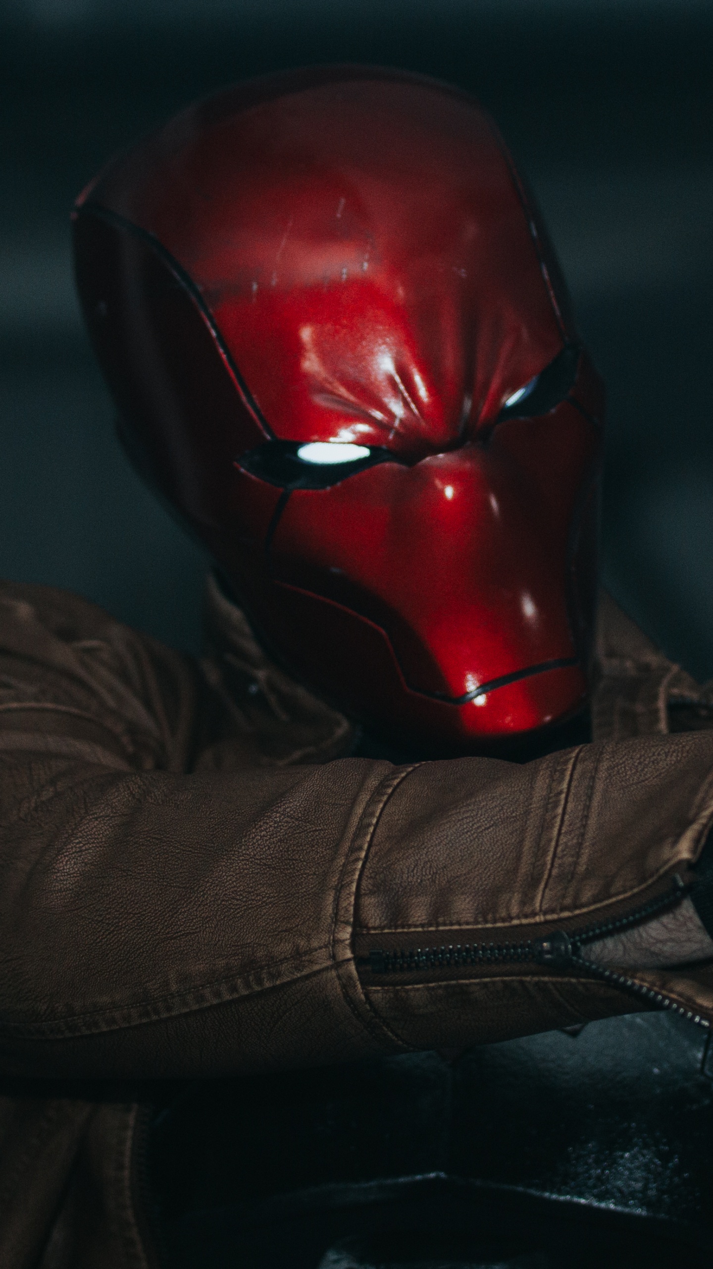 Person Wearing Red Helmet and Brown Jacket. Wallpaper in 1440x2560 Resolution