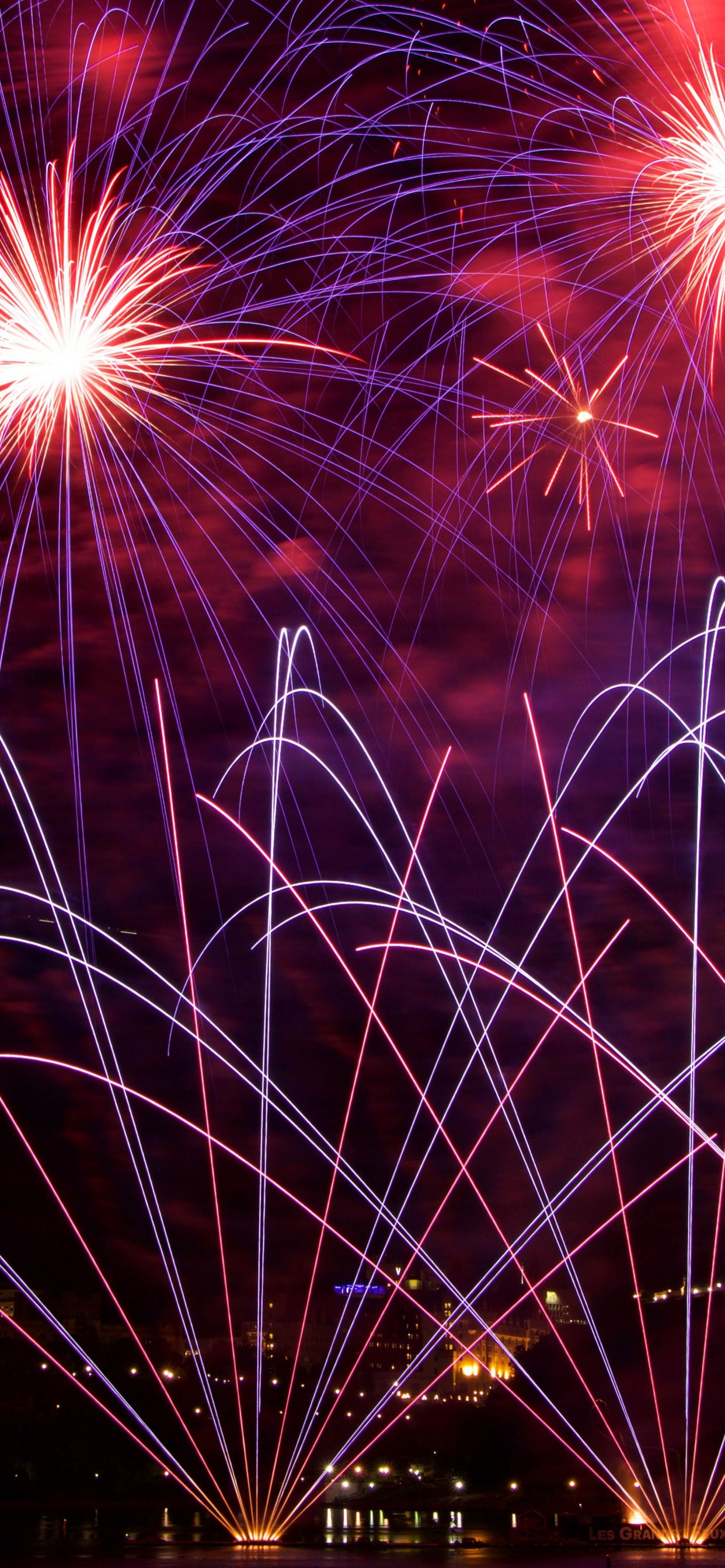 Fireworks Display During Night Time. Wallpaper in 1242x2688 Resolution