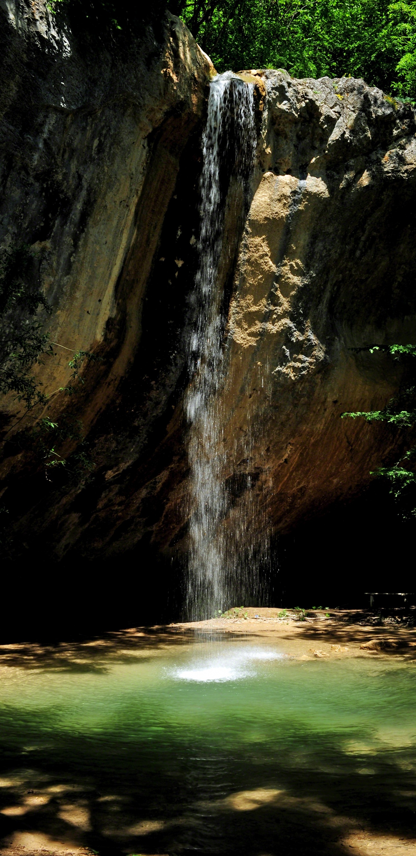 Water Falls in Cave During Daytime. Wallpaper in 1440x2960 Resolution