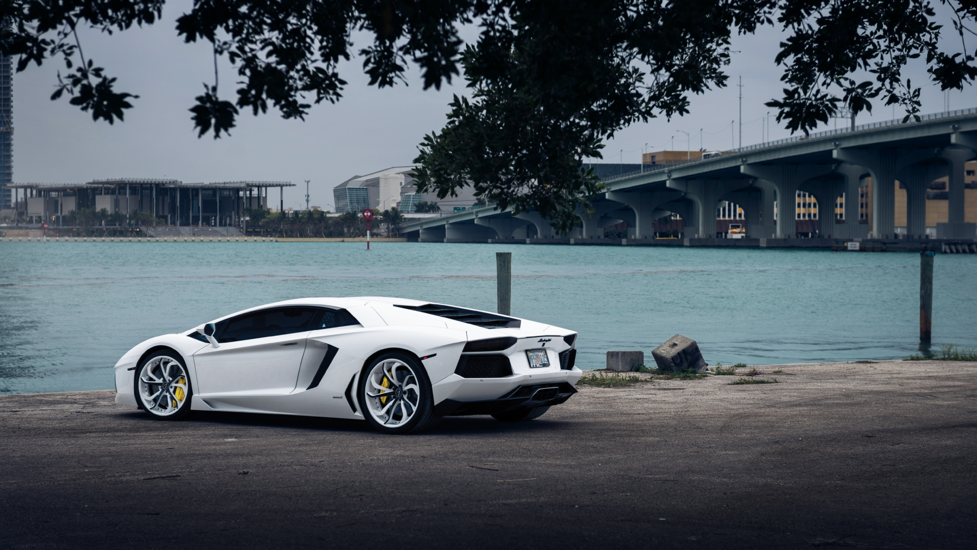White Porsche 911 Parked Near Body of Water During Daytime. Wallpaper in 1920x1080 Resolution