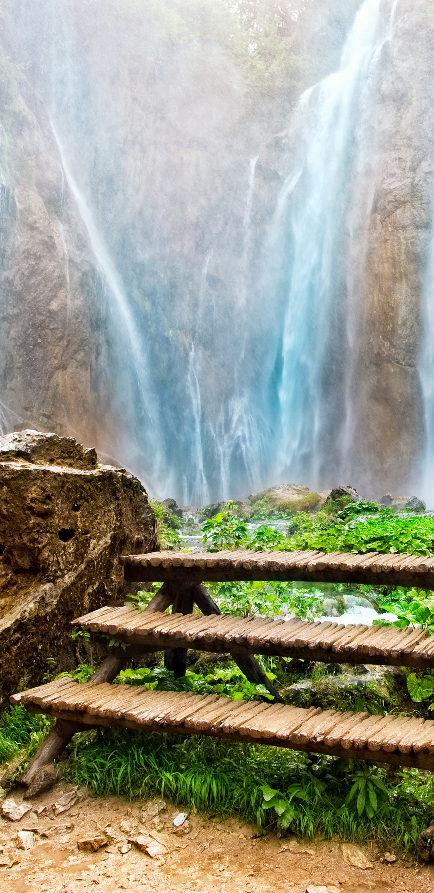 Brown Wooden Bench Near Waterfalls During Daytime. Wallpaper in 1440x2960 Resolution