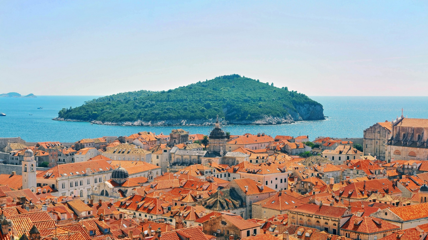 Aerial View of City Near Body of Water During Daytime. Wallpaper in 1366x768 Resolution