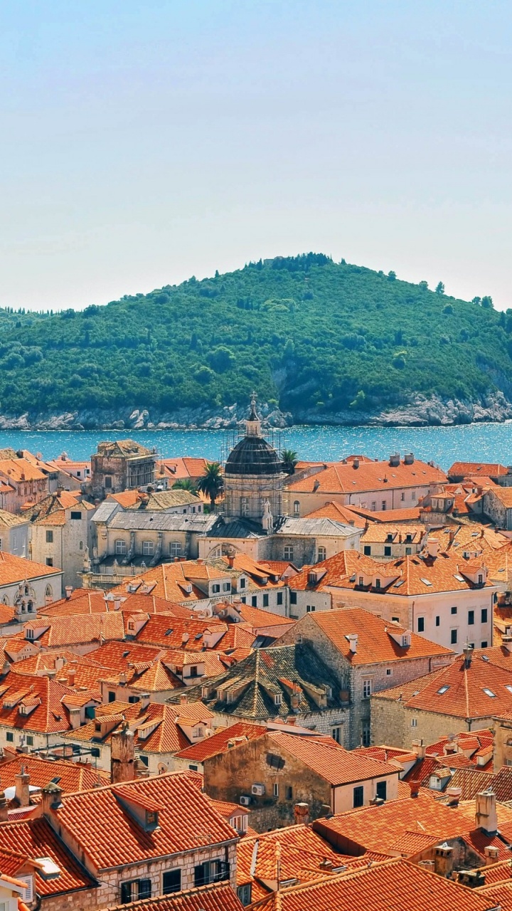 Aerial View of City Near Body of Water During Daytime. Wallpaper in 720x1280 Resolution