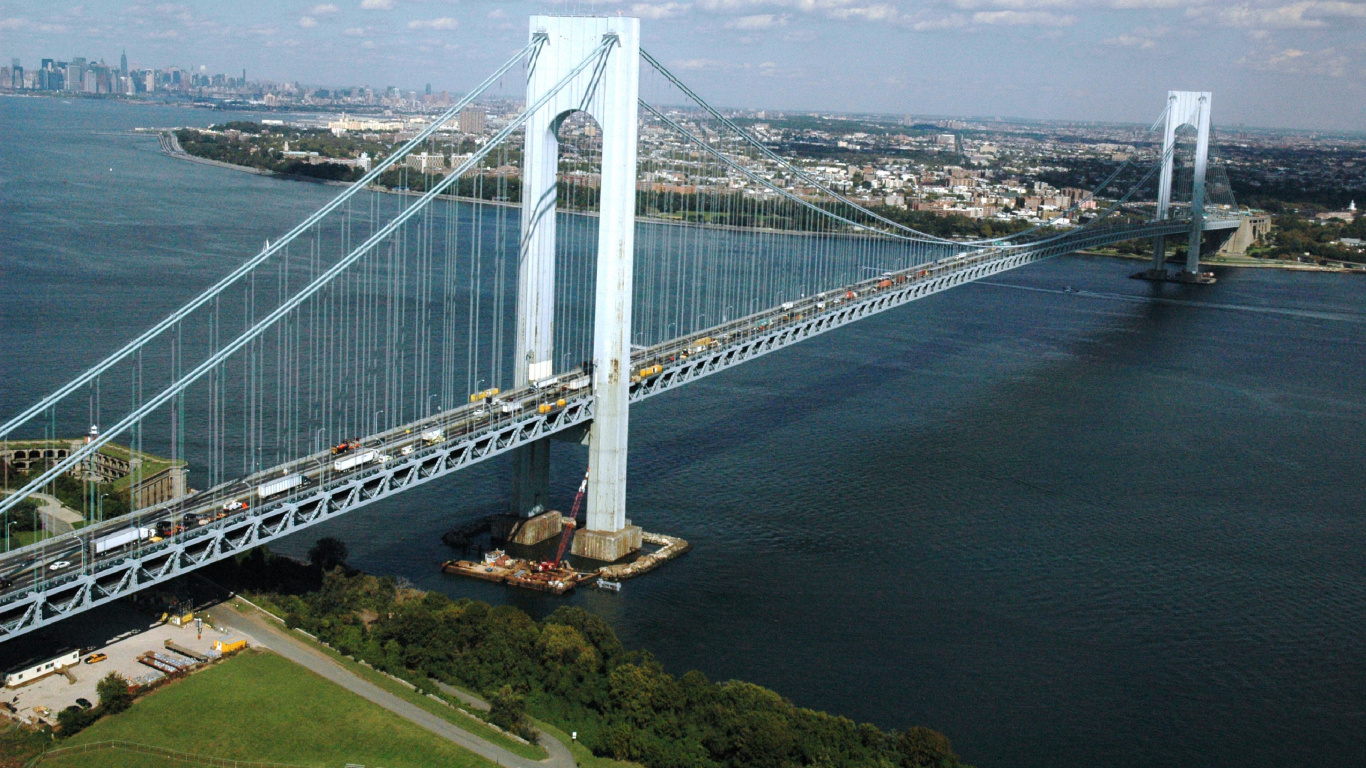 White Bridge Over The Sea Under White Clouds and Blue Sky During Daytime. Wallpaper in 1366x768 Resolution