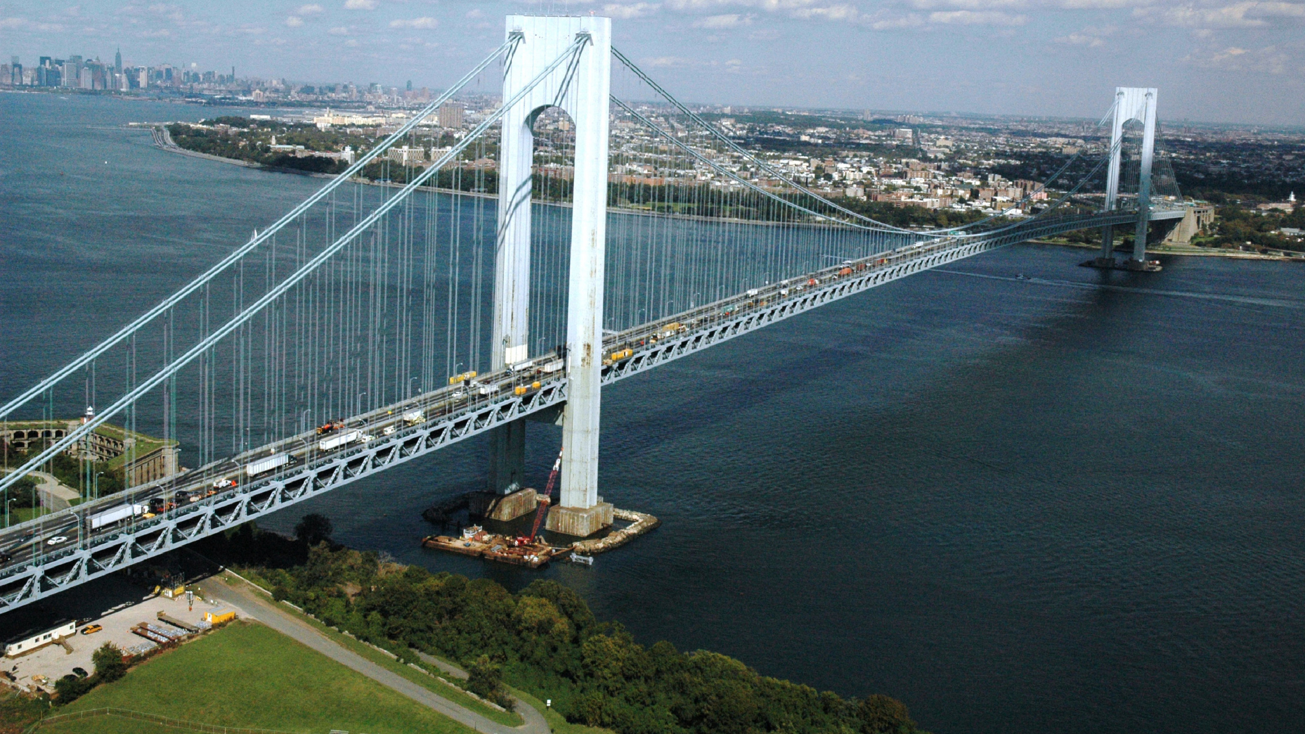 White Bridge Over The Sea Under White Clouds and Blue Sky During Daytime. Wallpaper in 2560x1440 Resolution