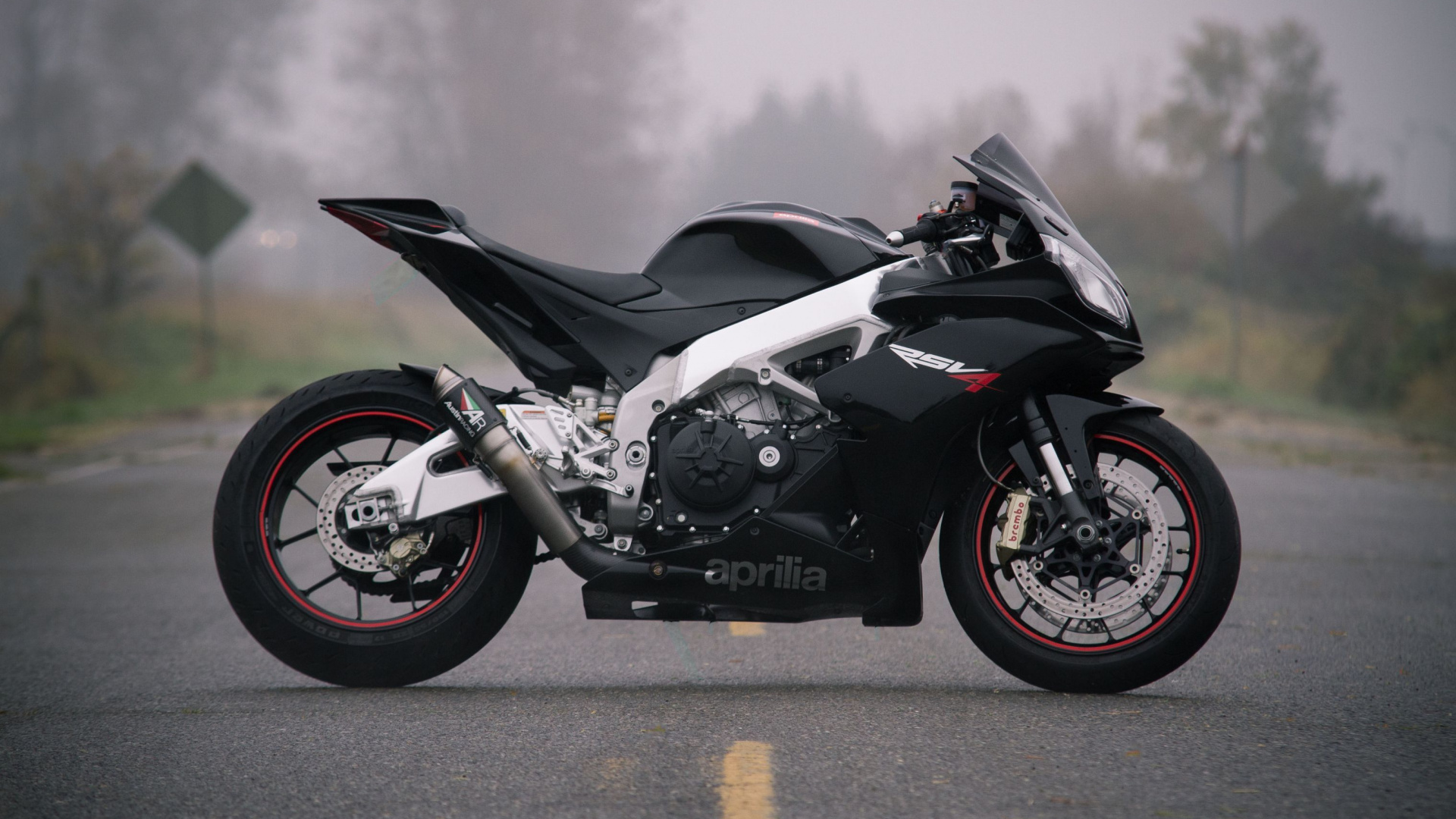 Black and Gray Sports Bike on Road During Daytime. Wallpaper in 1920x1080 Resolution