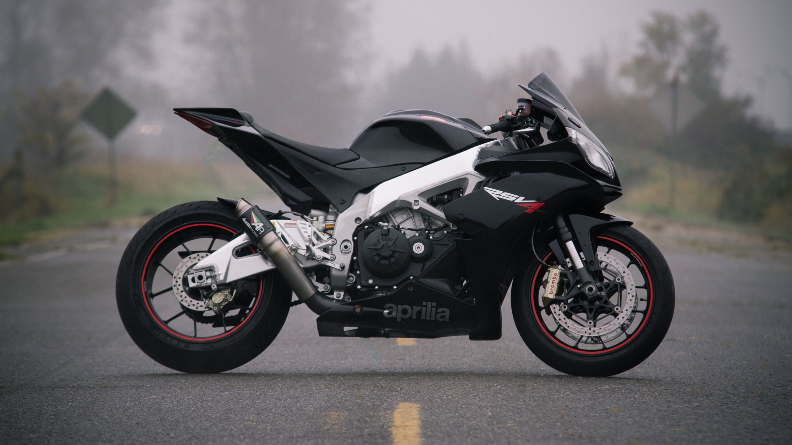 Black and Gray Sports Bike on Road During Daytime. Wallpaper in 2560x1440 Resolution