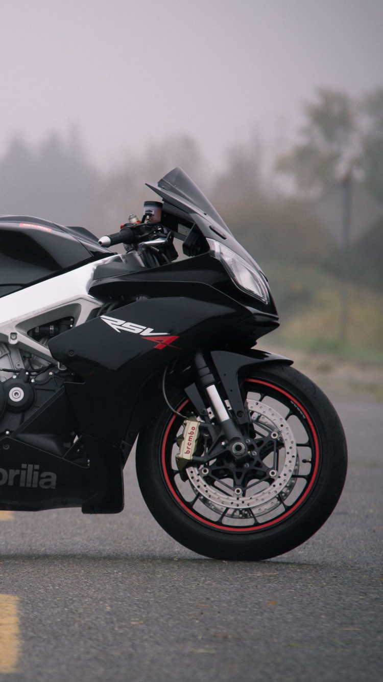 Black and Gray Sports Bike on Road During Daytime. Wallpaper in 750x1334 Resolution