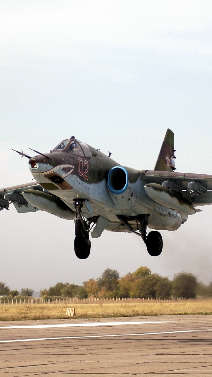 Gray Fighter Plane on Brown Field During Daytime. Wallpaper in 720x1280 Resolution