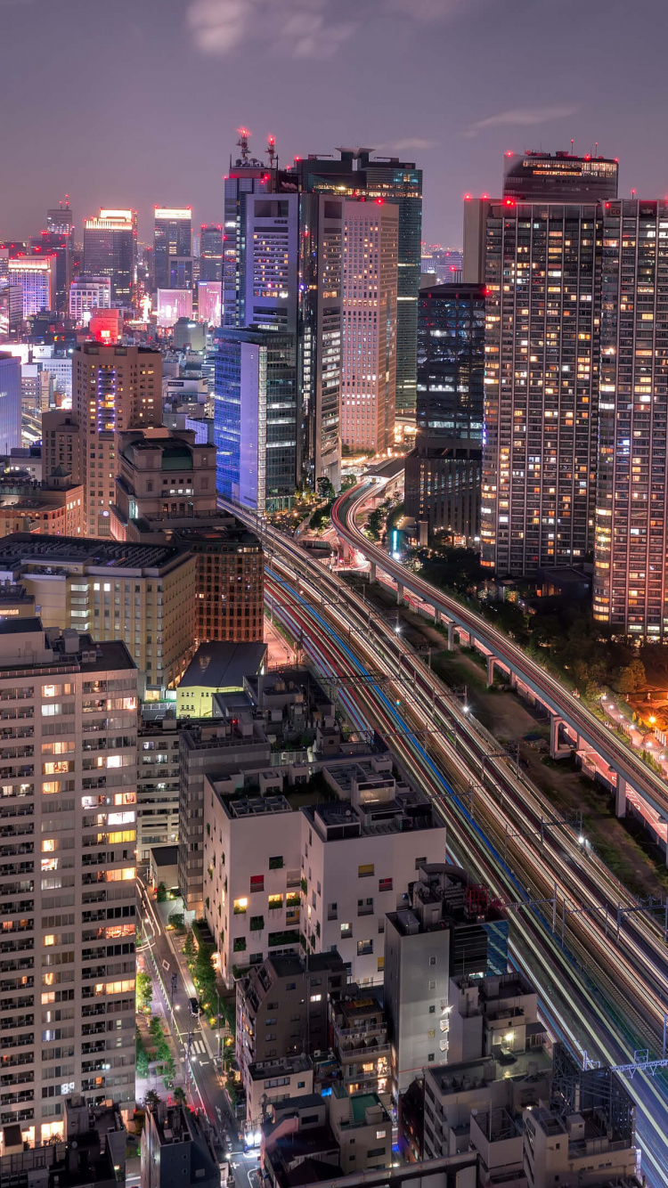 City Buildings During Night Time. Wallpaper in 750x1334 Resolution